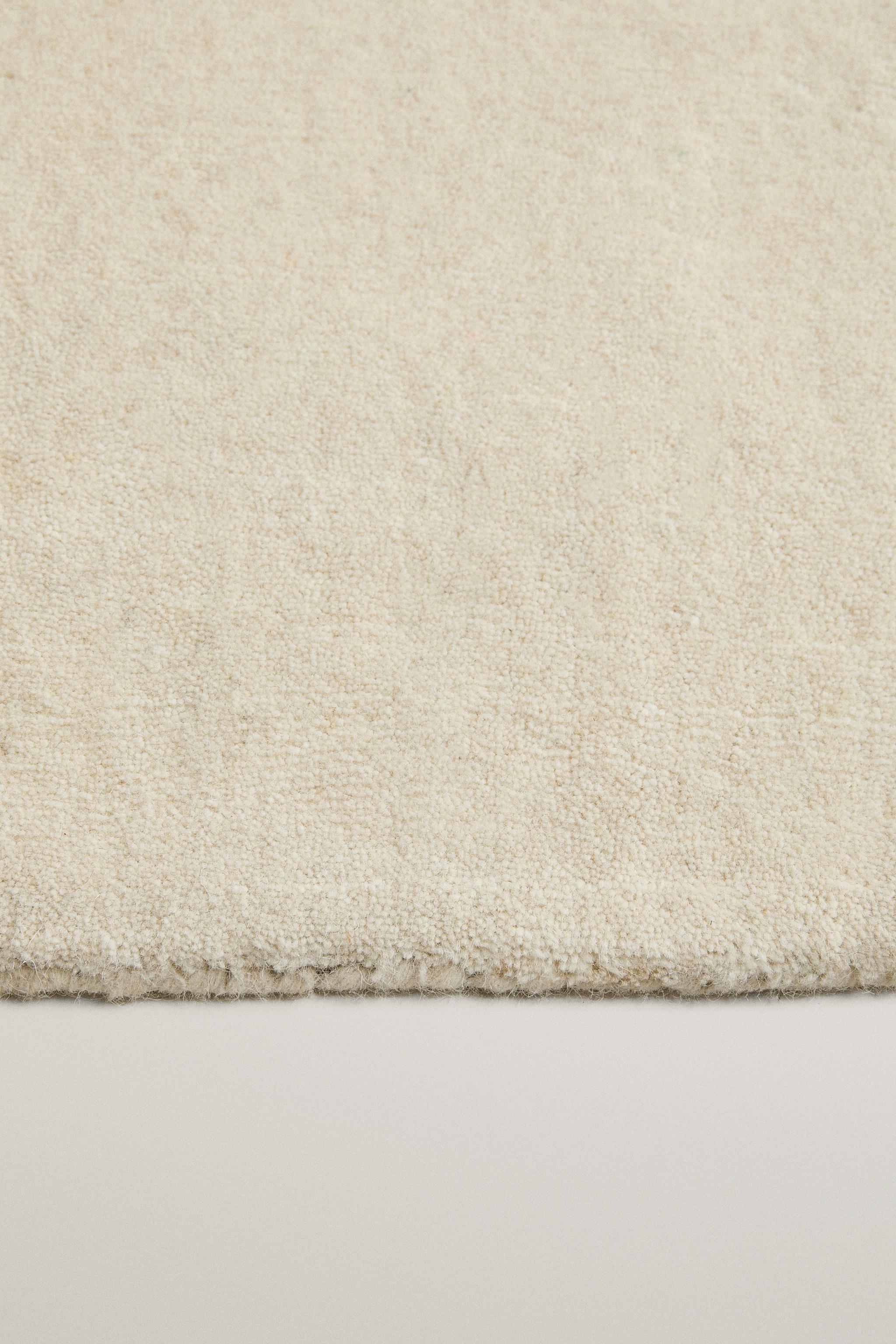 SOLID WOOL RUG