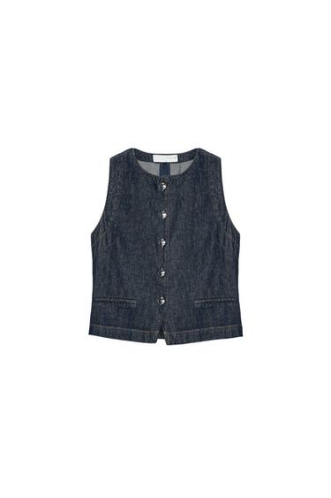 Front view of a fitted blue waistcoat with a round neck, sleeveless design, faux front pockets, and metal button fastening.