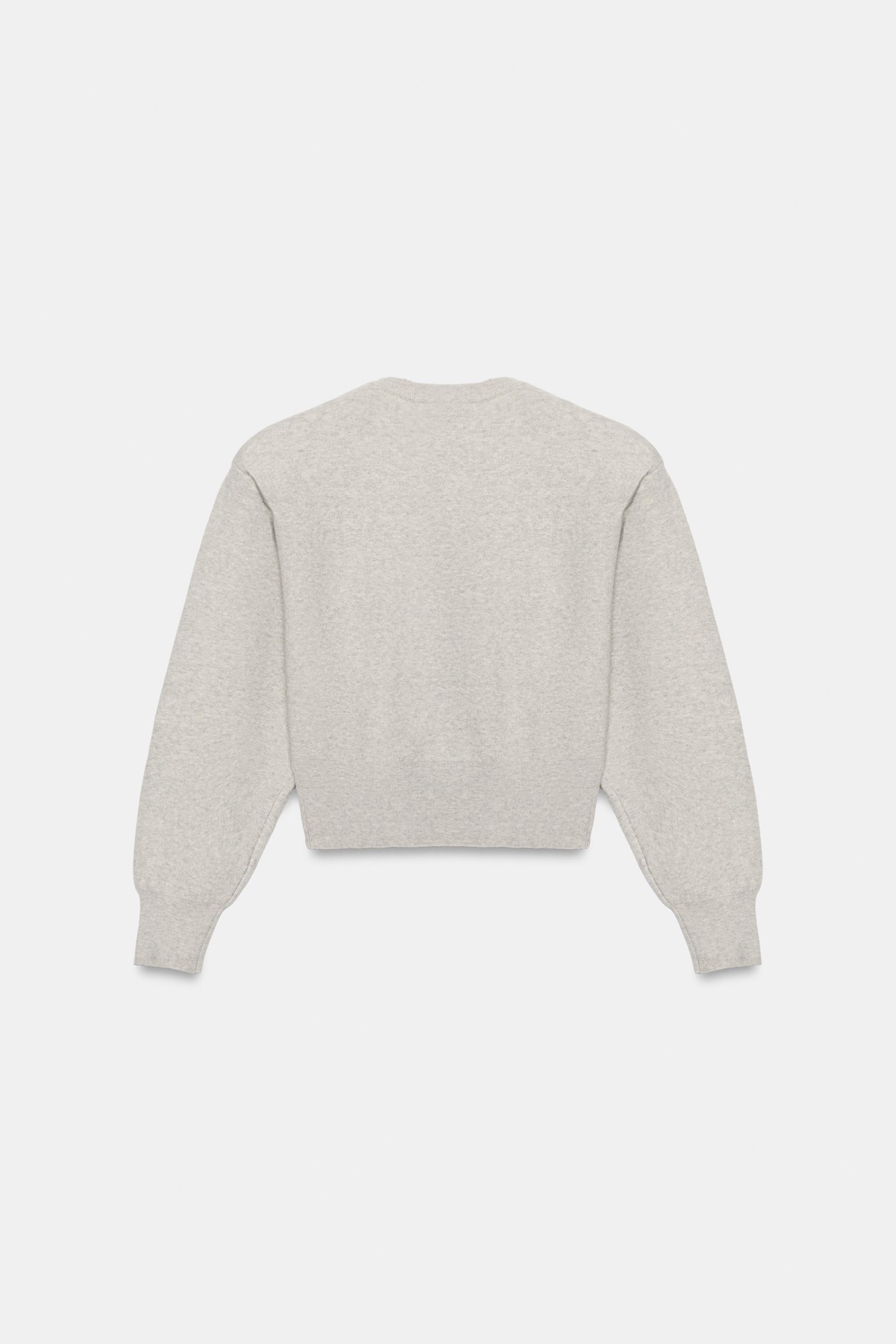 PULL EN MAILLE ÉPAULETTE