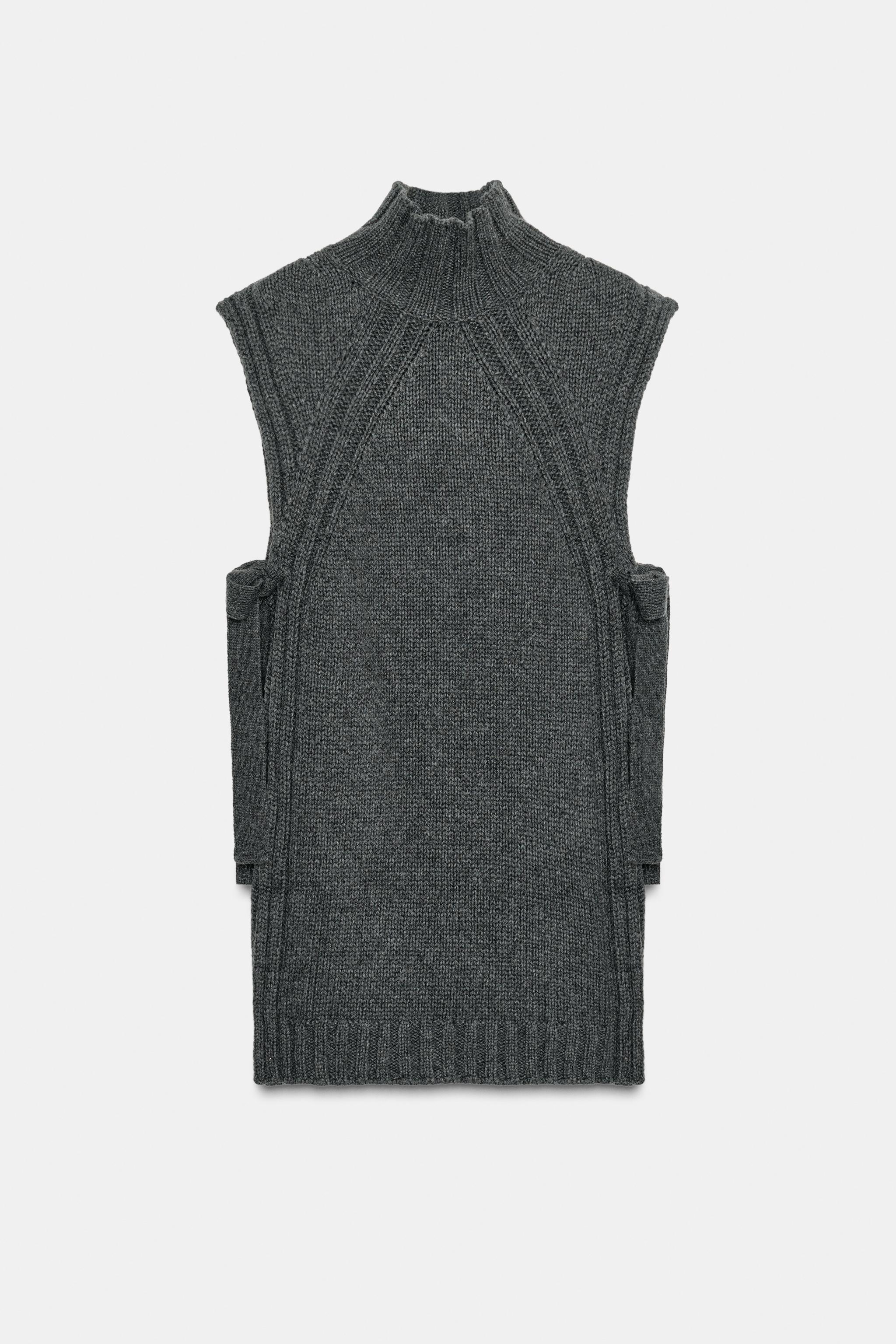 GILET EN LAINE AVEC OUVERTURES
