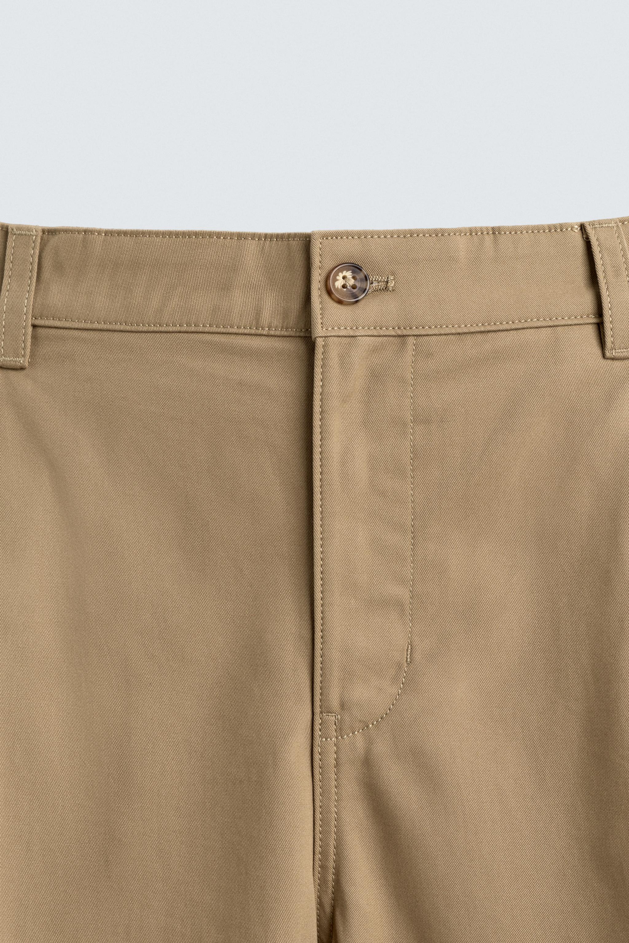 PANTALON COUPE LARGE À PLIS