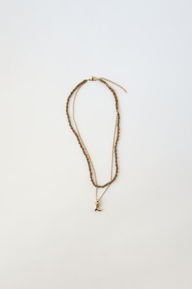 COLLIER DOUBLE AVEC PERLES FANTAISIE ET BOTTE COWBOY - Doré de Zara - Image 0