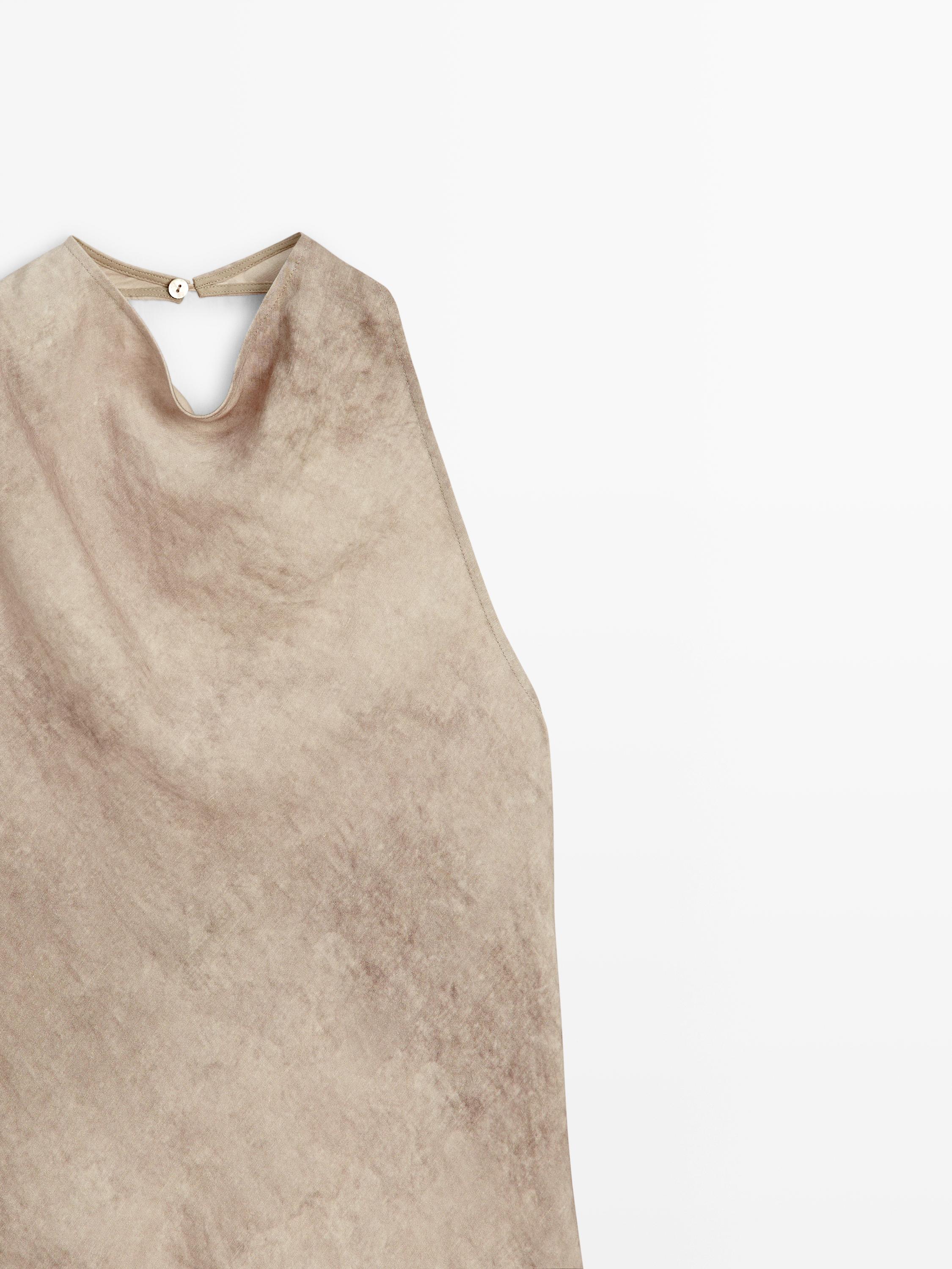 Worn effect halter top