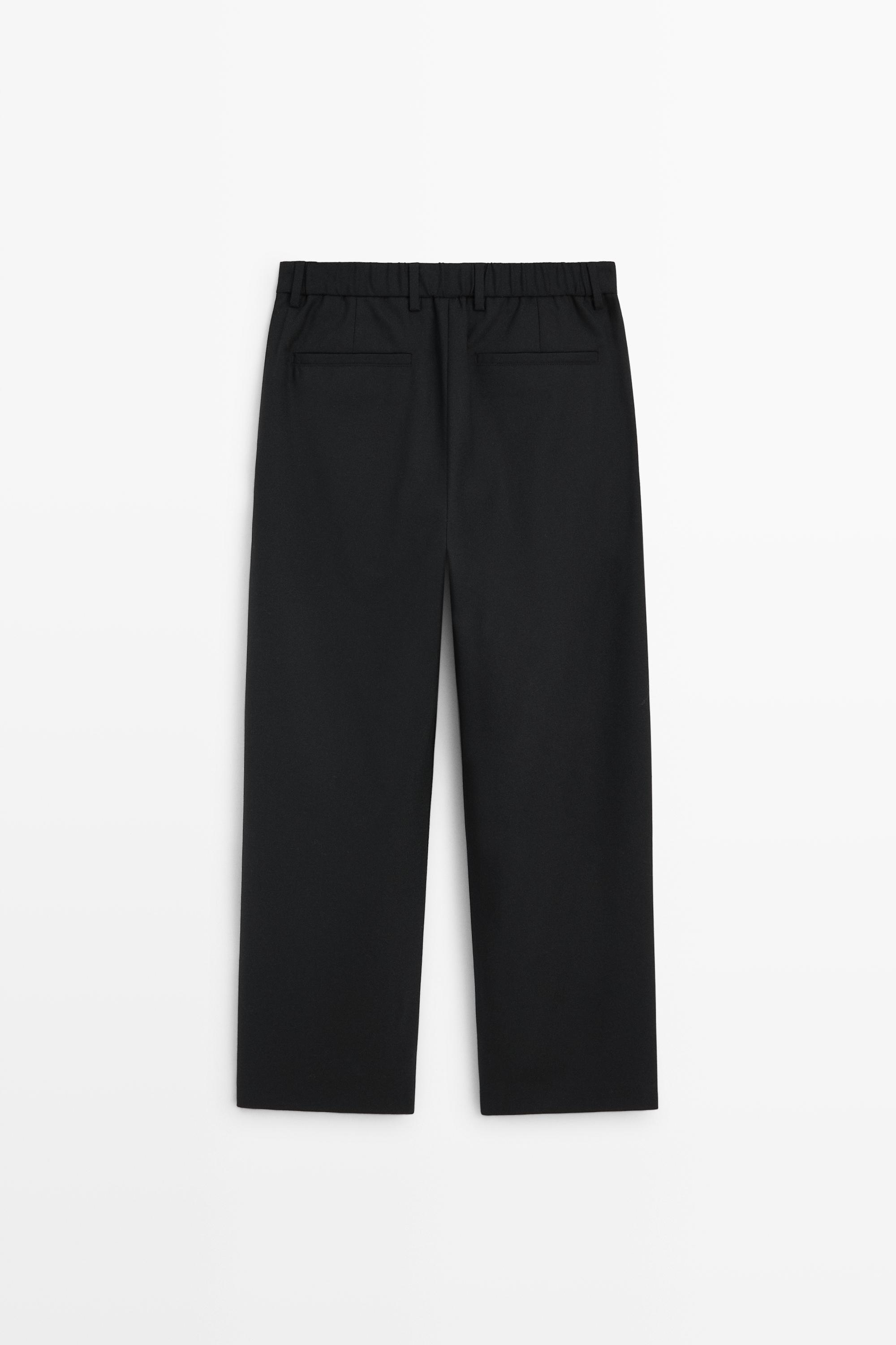 Double-pleated relaxed fit pants