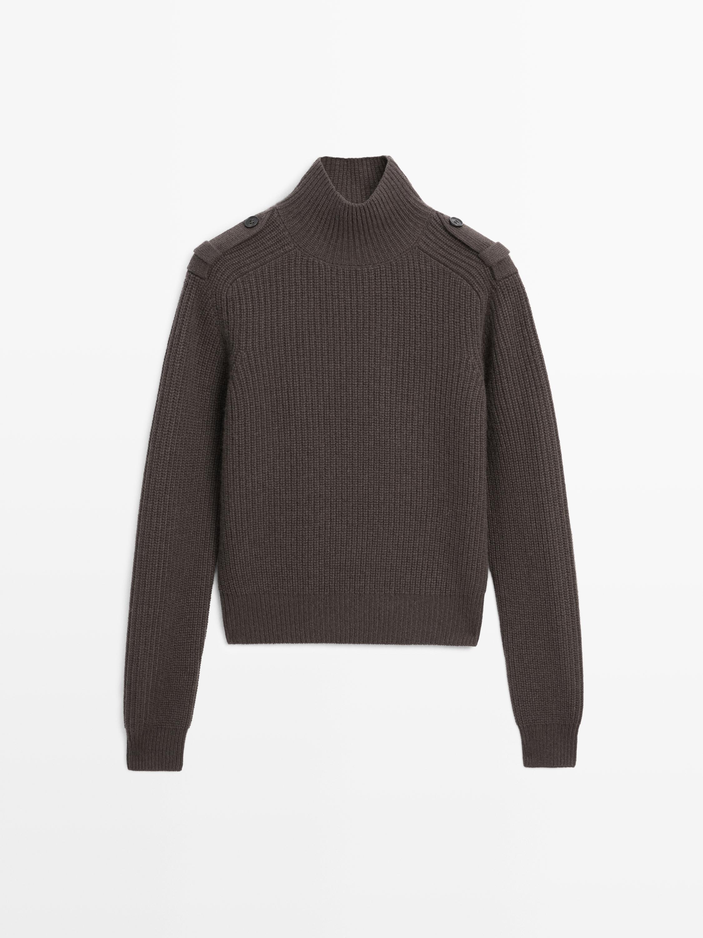 Knit sweater with shoulder detail