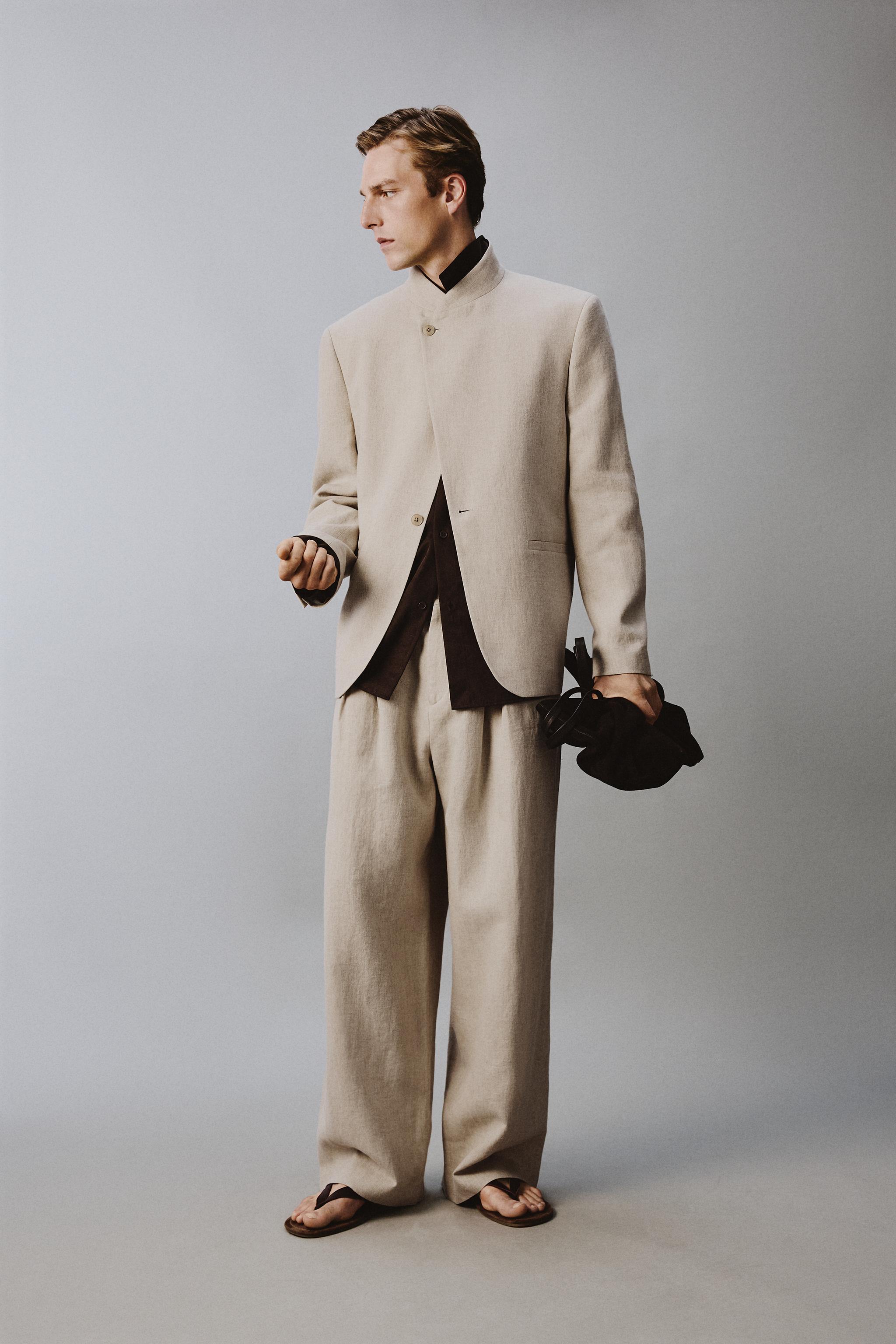 RELAXED FIT PLEATED SUIT PANTS