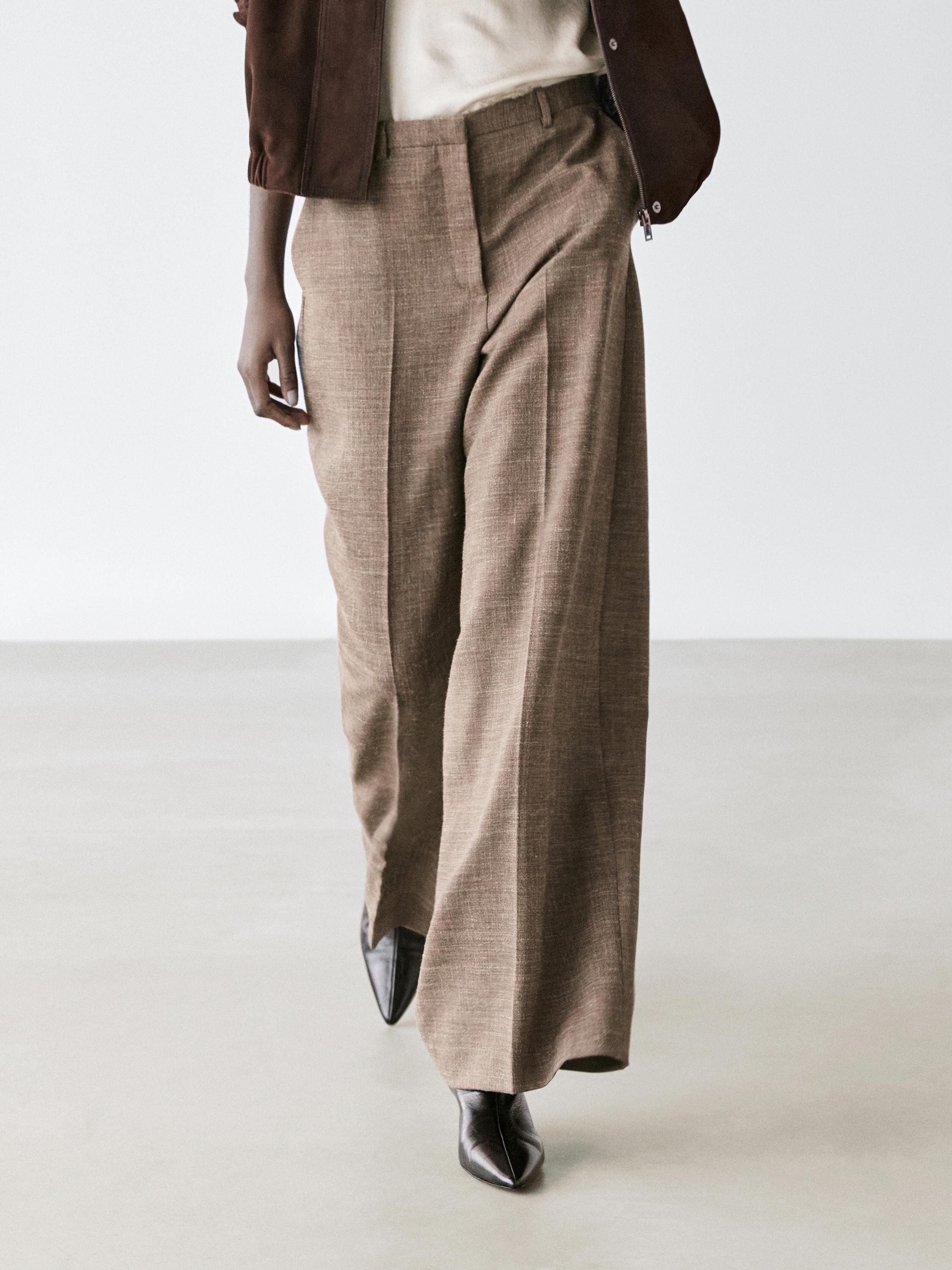 Wide-leg voluminous wool blend trousers