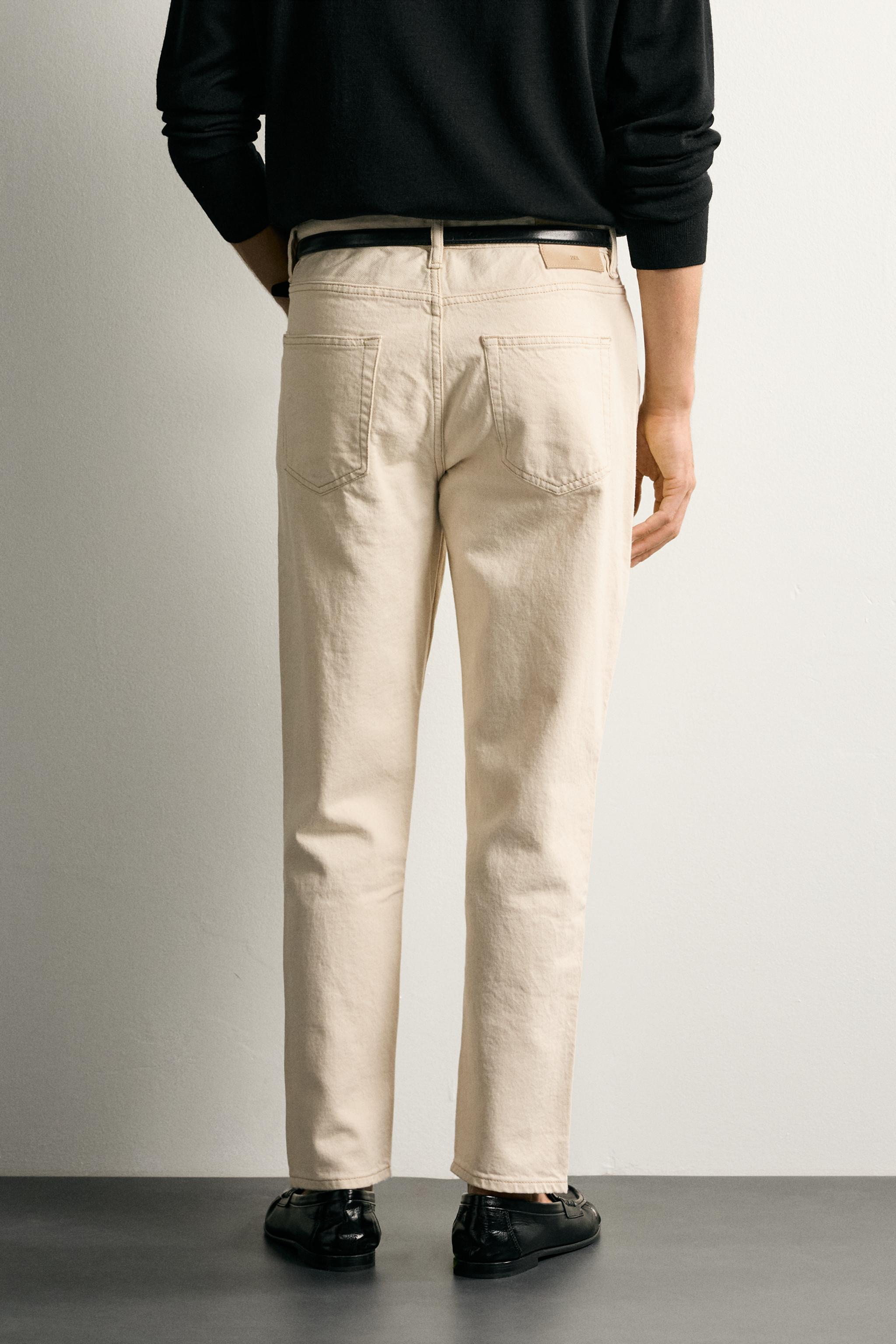 SLIM TAPERED FIT JEANS