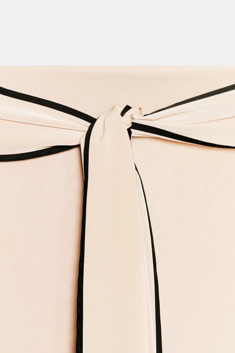 Falda midi satinada con nudo 7