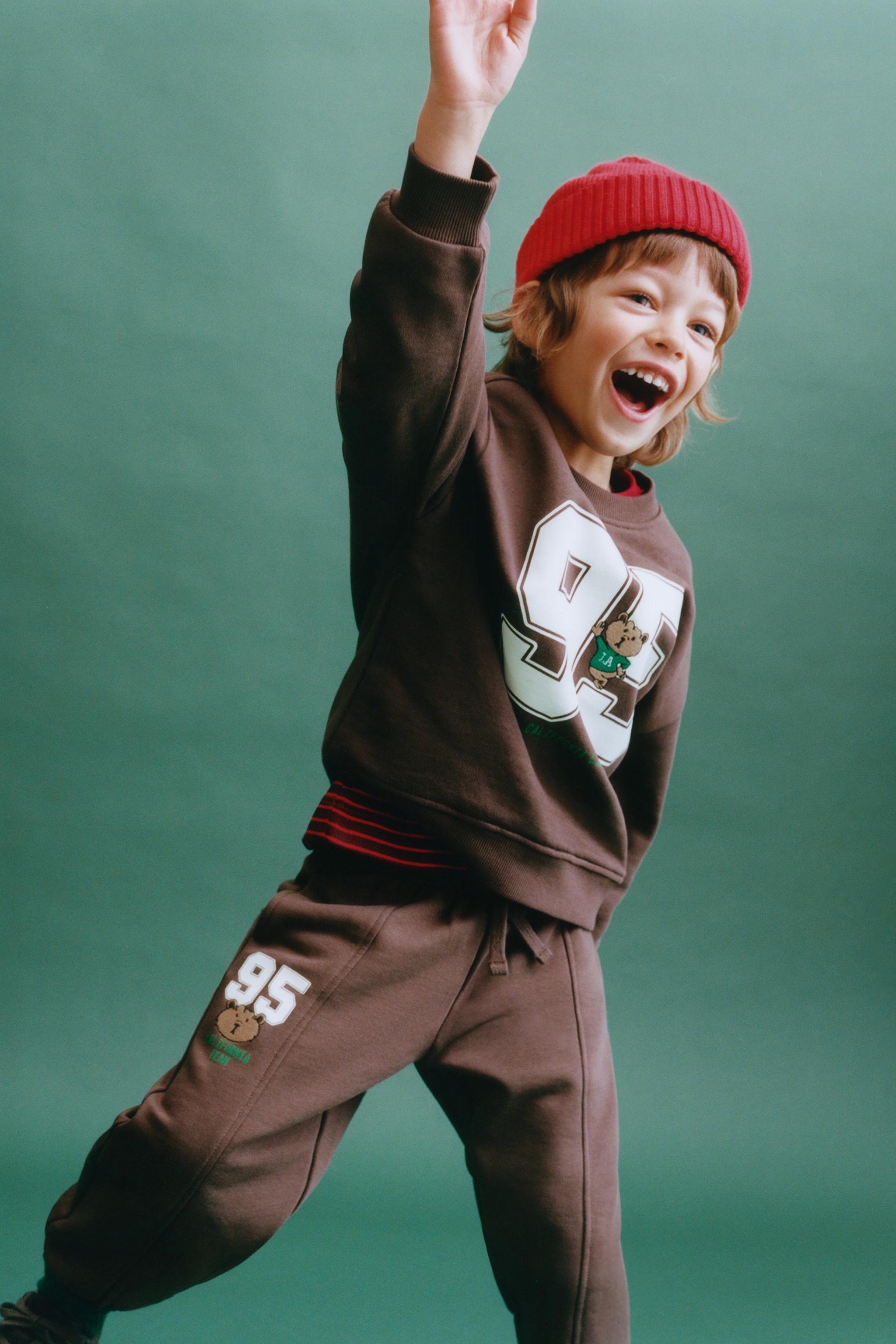 EMBROIDERED ANIMAL NUMBER JOGGING PANTS