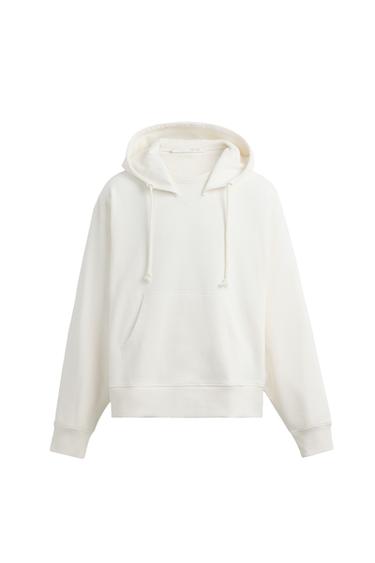 Front view of a white hoodie with a hood and front pocket.