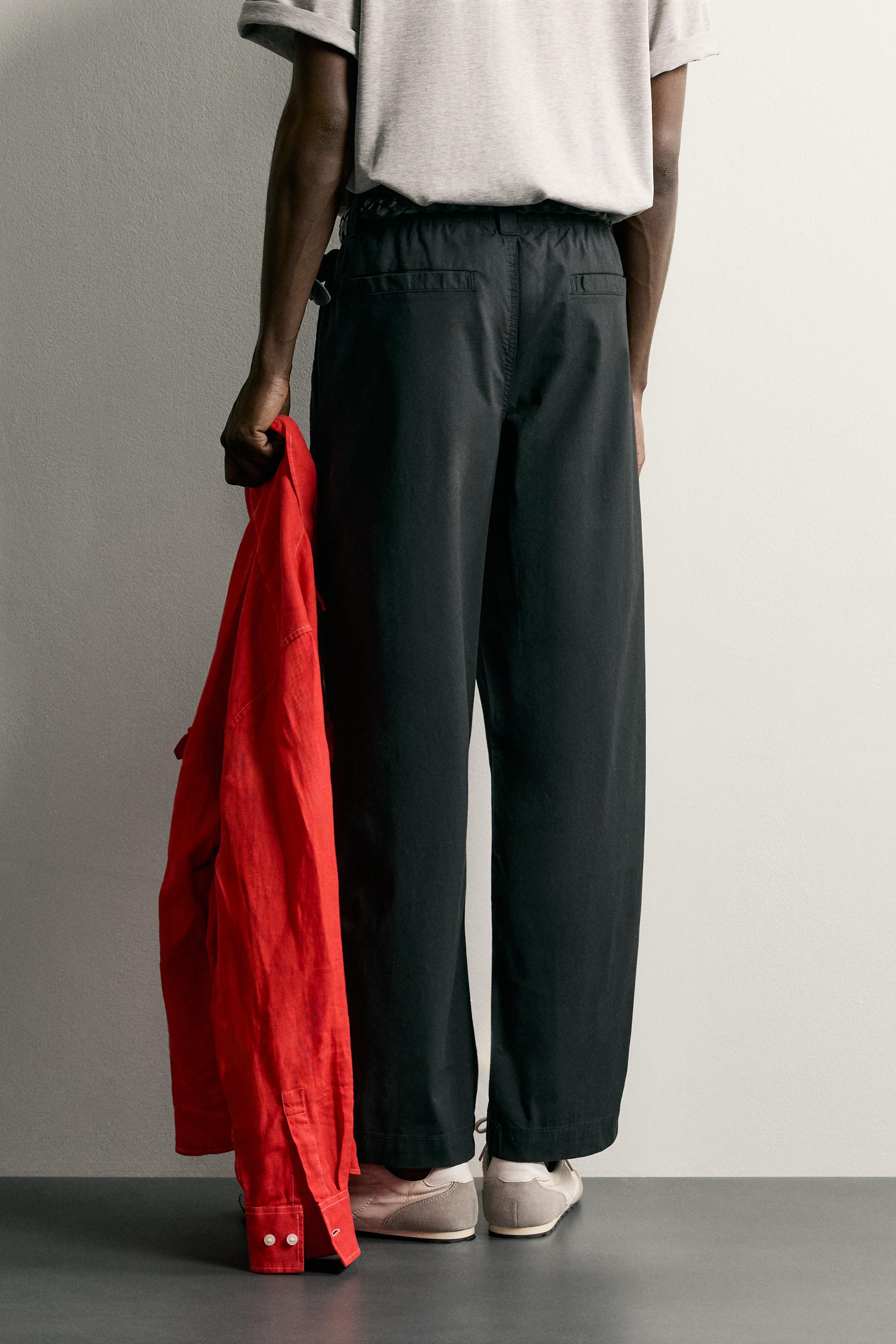 PLEATED RELAXED-FIT PANTS