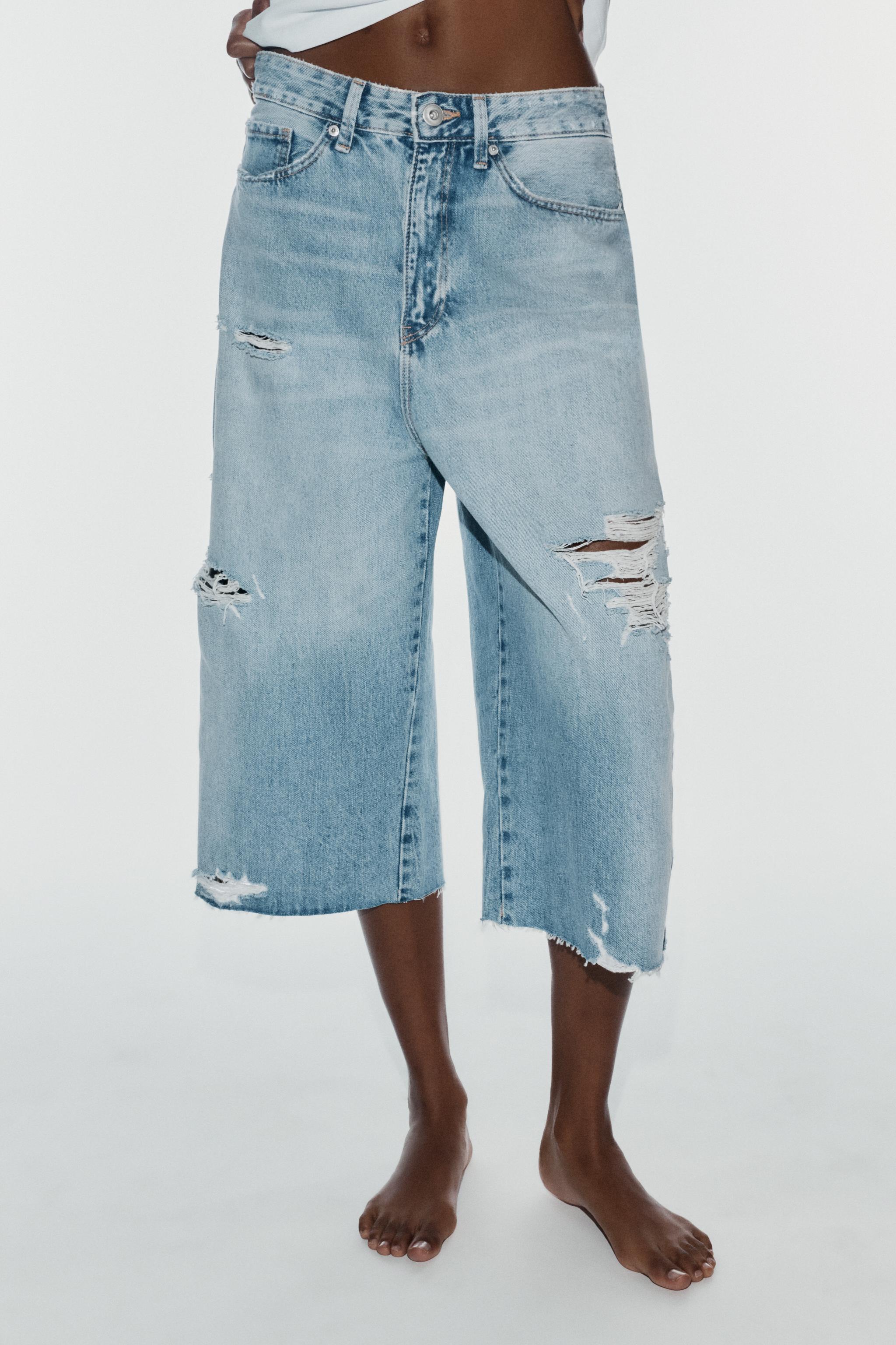 MID-RISE RIPPED BAGGY DENIM JORTS — Light blue