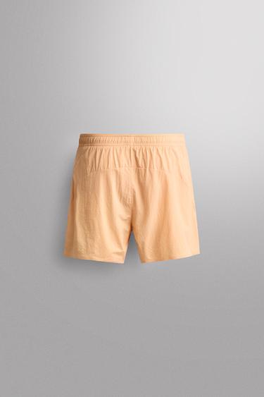 PANTALONS CURTS RUNNING 5" - Taronja de Zara