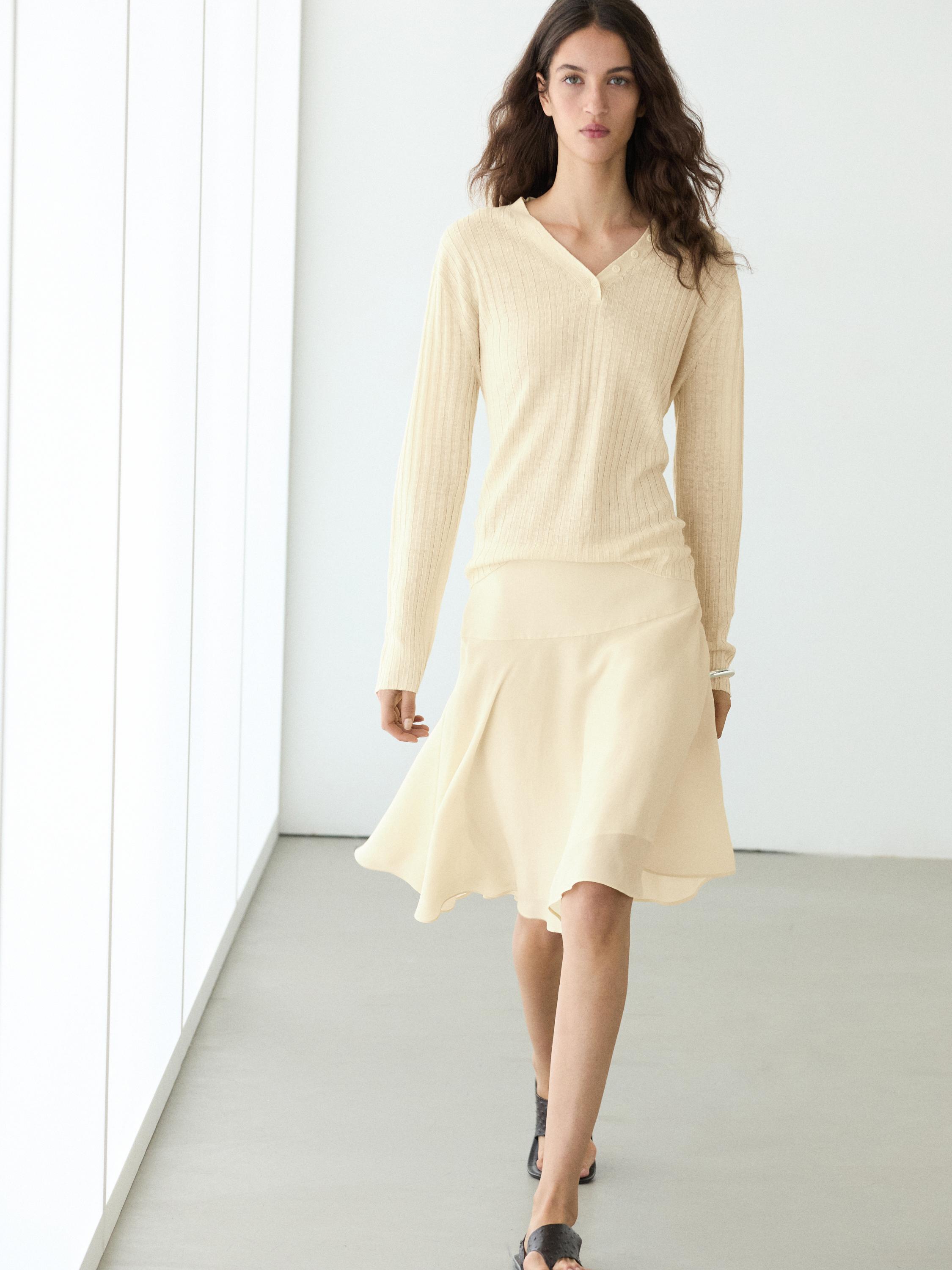 Flowing asymmetric midi skirt