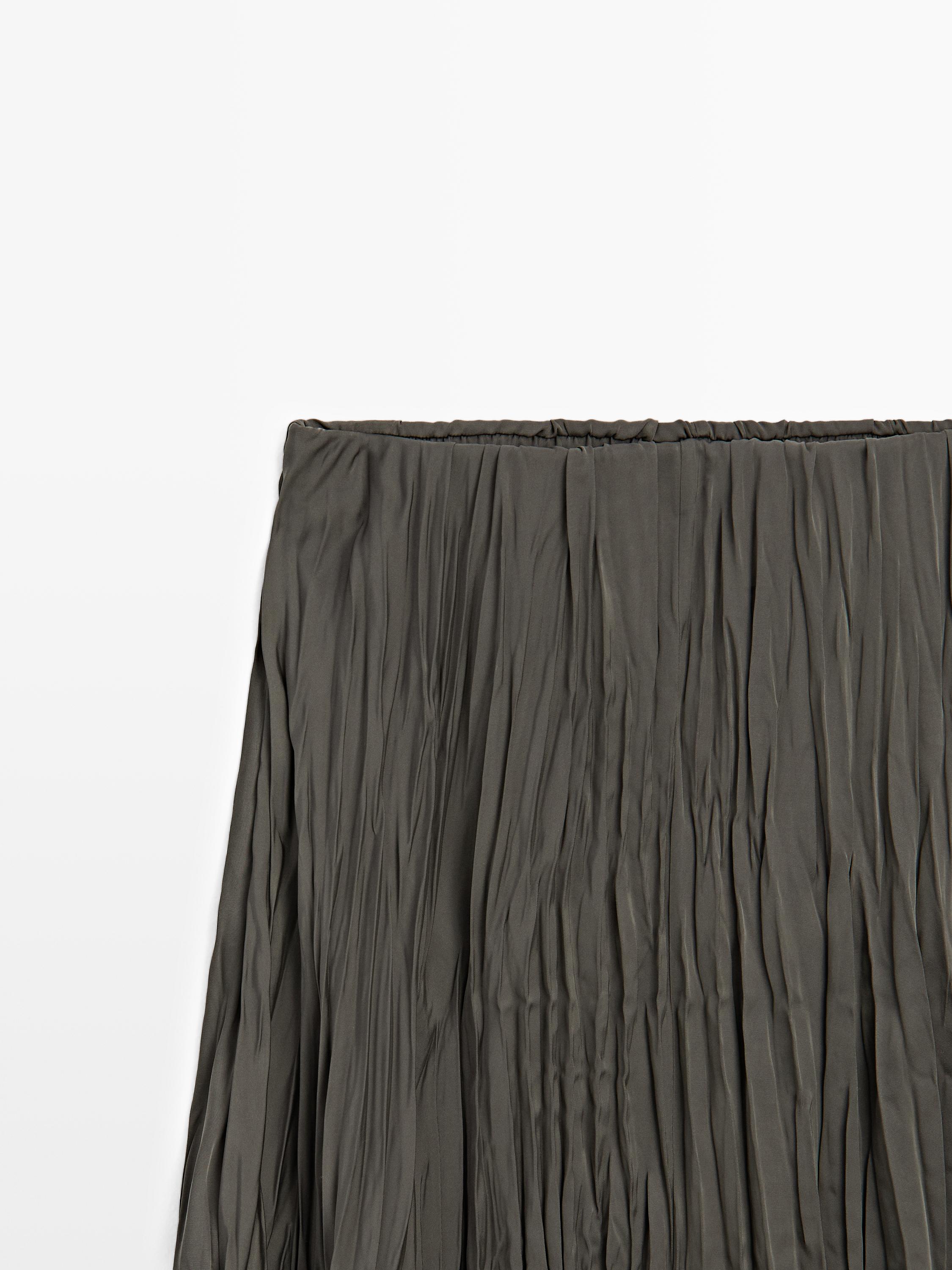 Long flowing pleated skirt