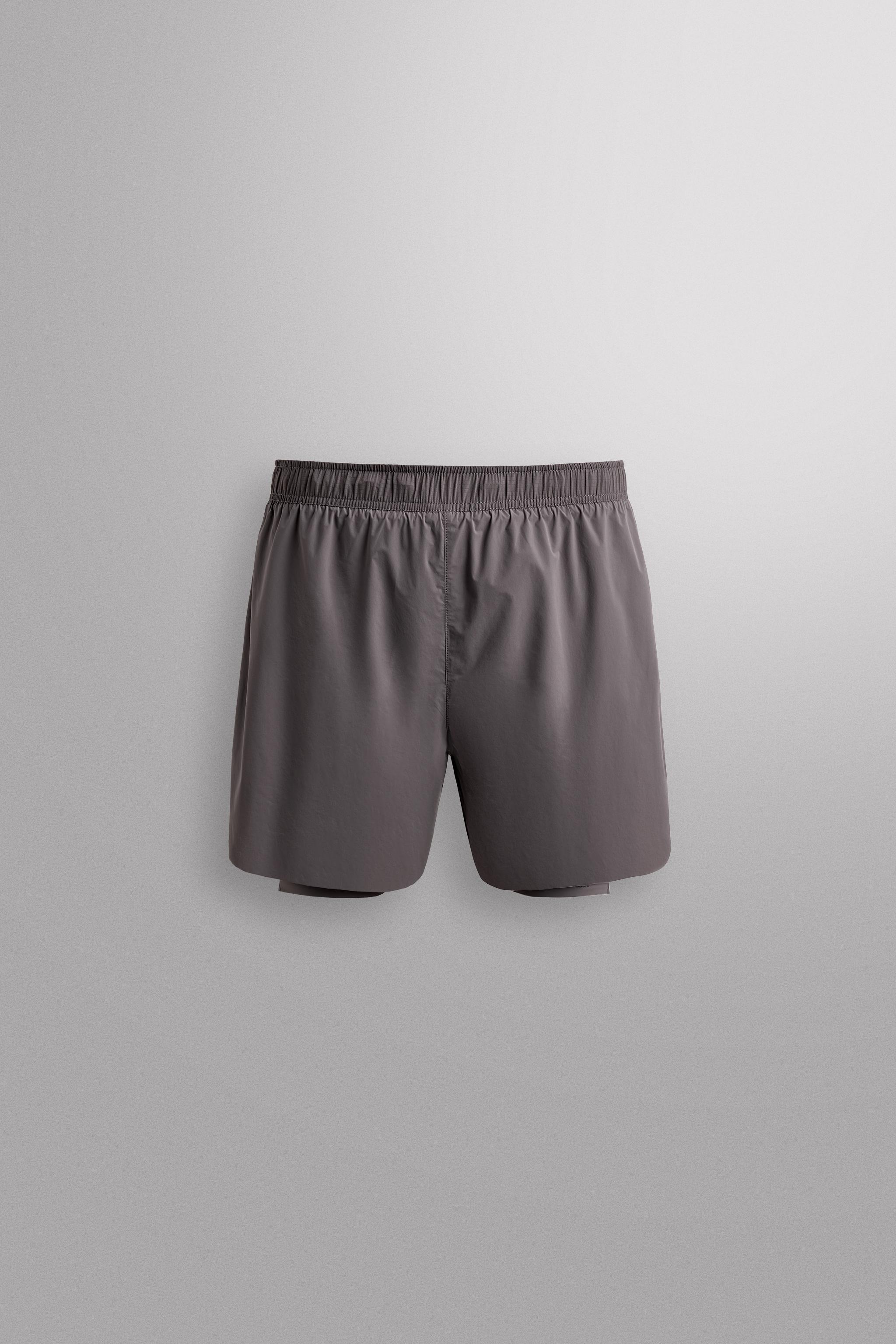 2-IN-1 RUNNING SHORTS — Purple