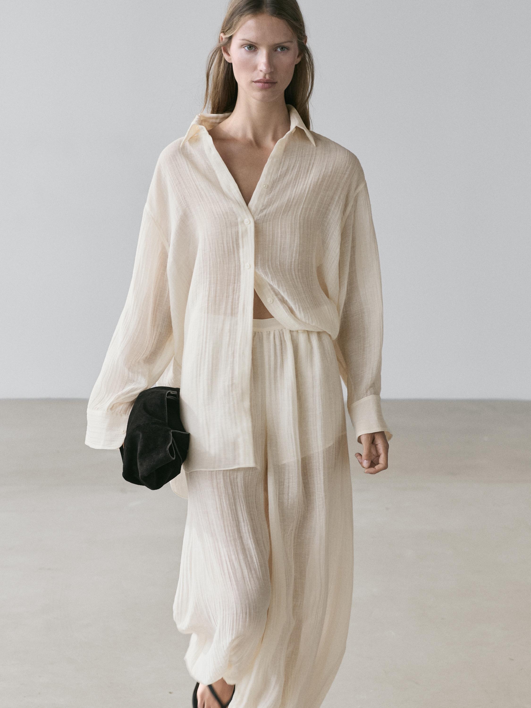 Flowing shirt with pleated detail