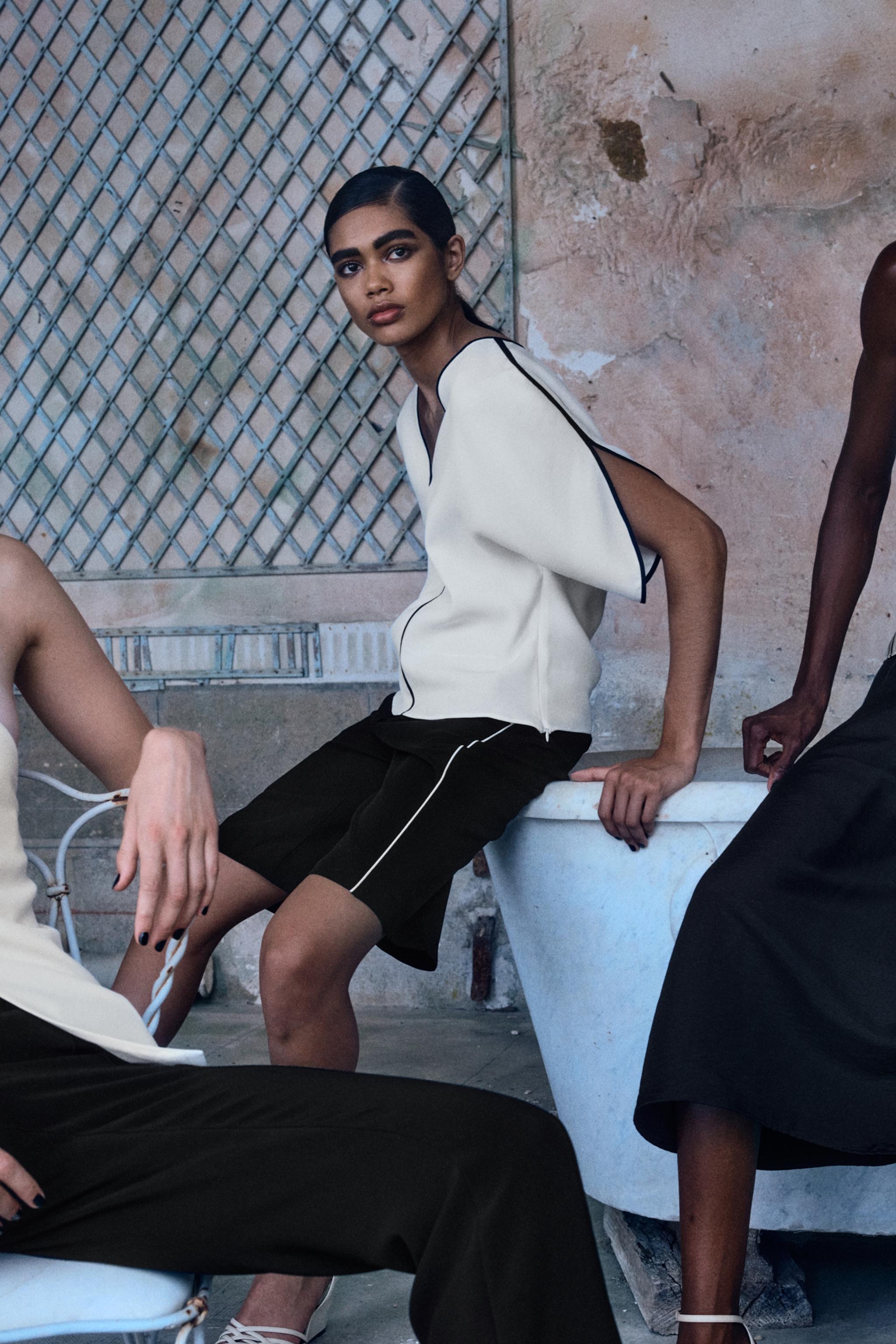 LONG CONTRAST PIPING SHORTS — Black