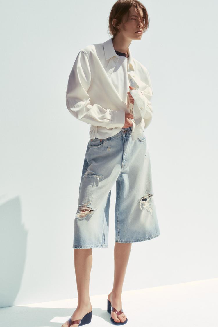 MID-RISE RIPPED DENIM BERMUDA JORTS