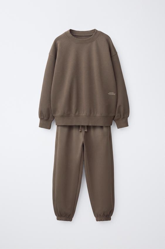 CONJUNTO JOGGING SUDADERA Y PANTALÓN INTERLOCK TEXTO - marron-vison de Zara - Imagen 0