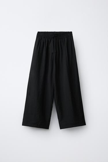 QUẦN ỐNG RỘNG HIỆU ỨNG NHĂN - Màu đen từ Zara