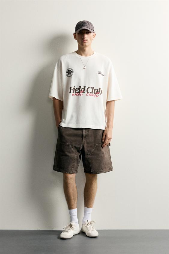 CAMISETA ESTRUCTURA ESTAMPADOS CONTRASTE - Blanco roto de Zara - Imagen 0