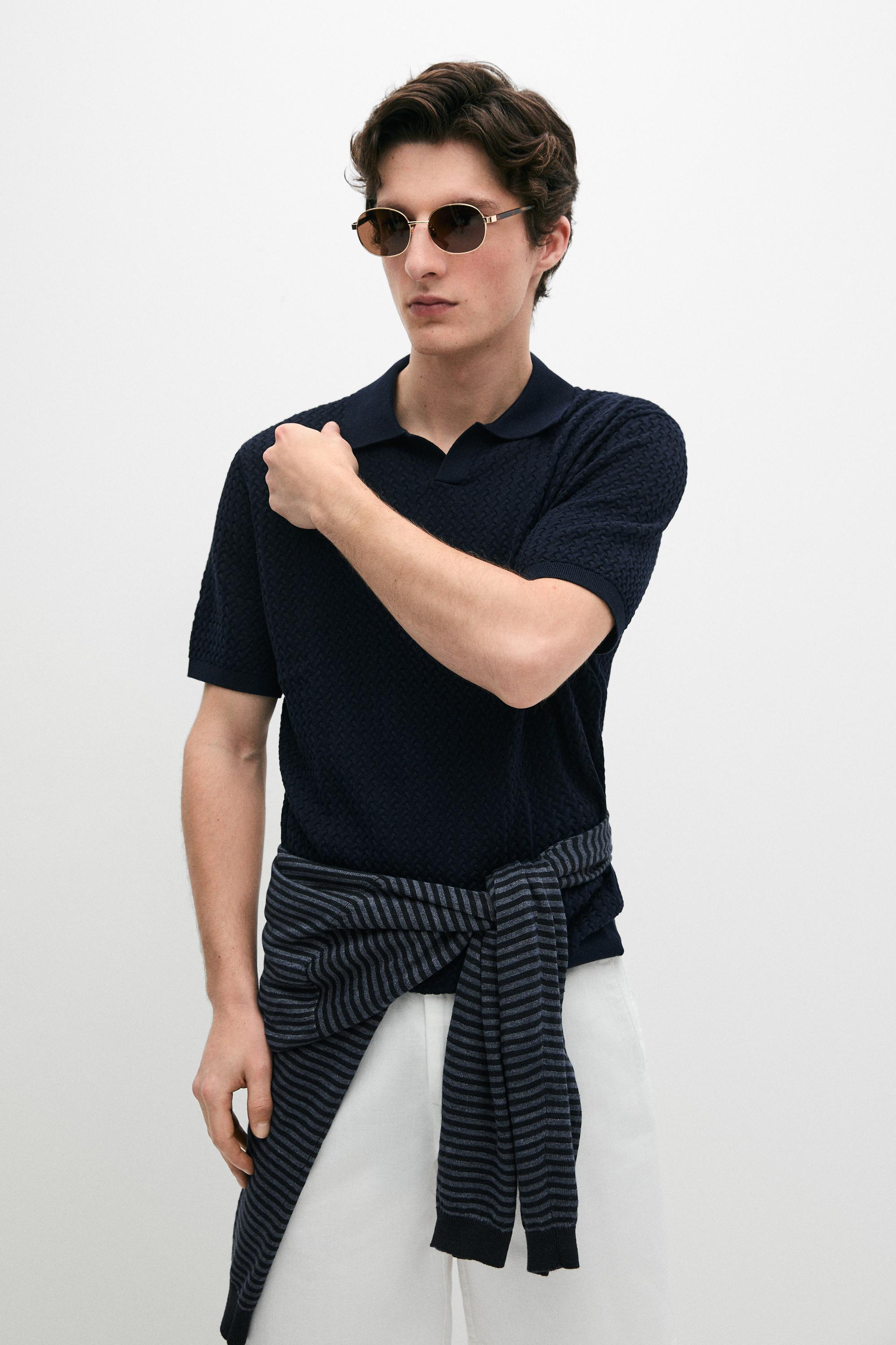 Polo en maille torsadée à col V