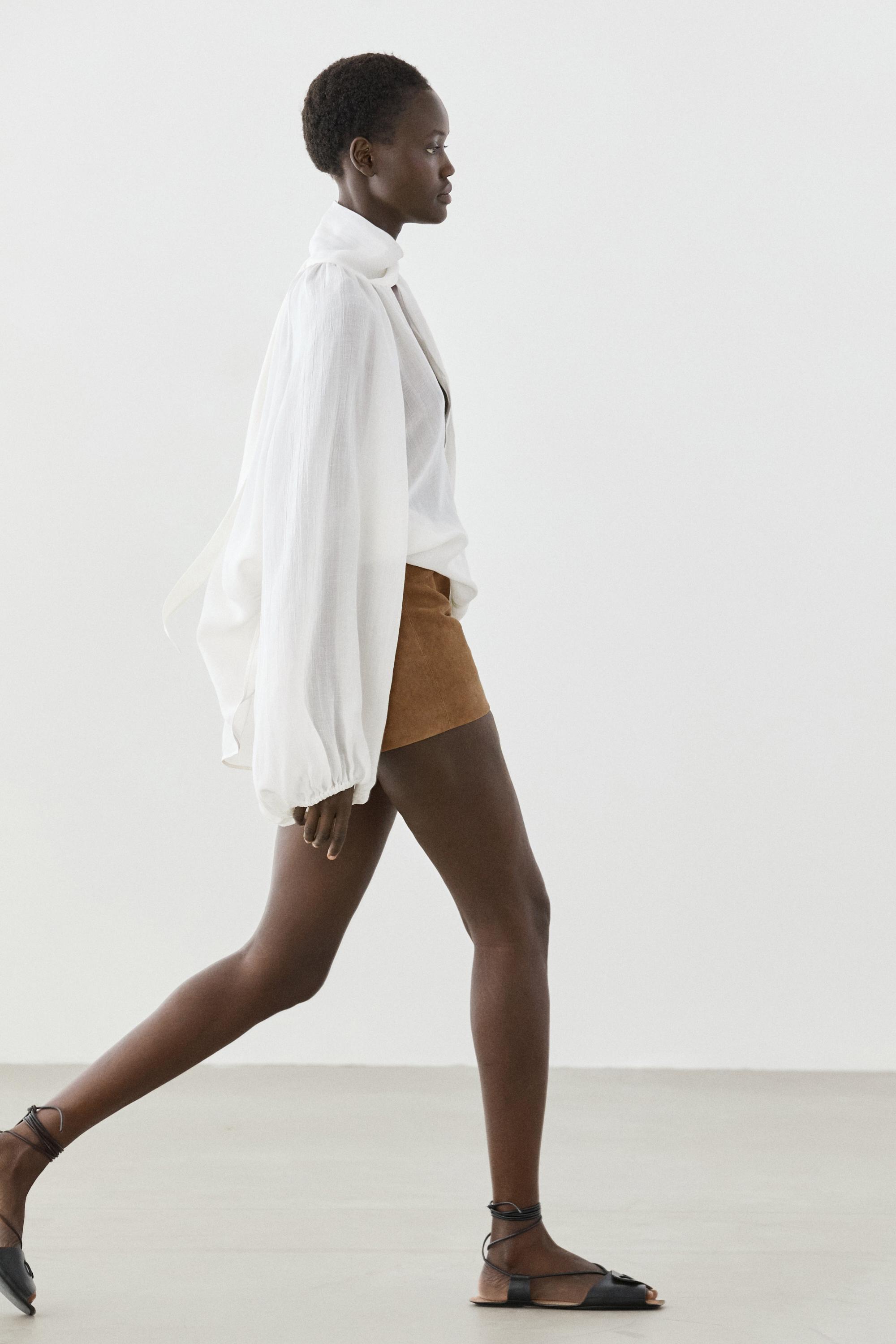 Blouse fluide col en V avec nœud