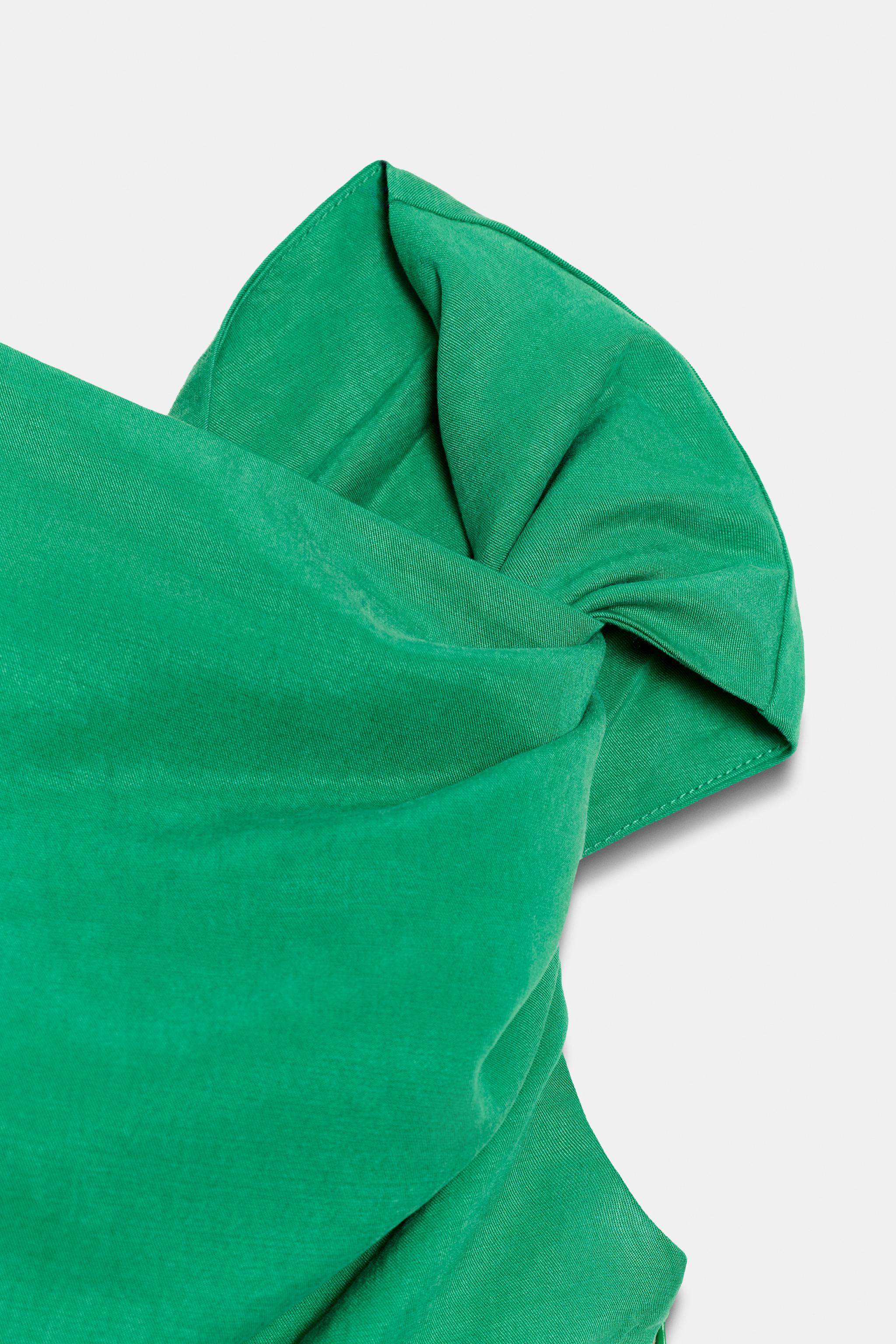 ASYMMETRIC DRAPED TOP