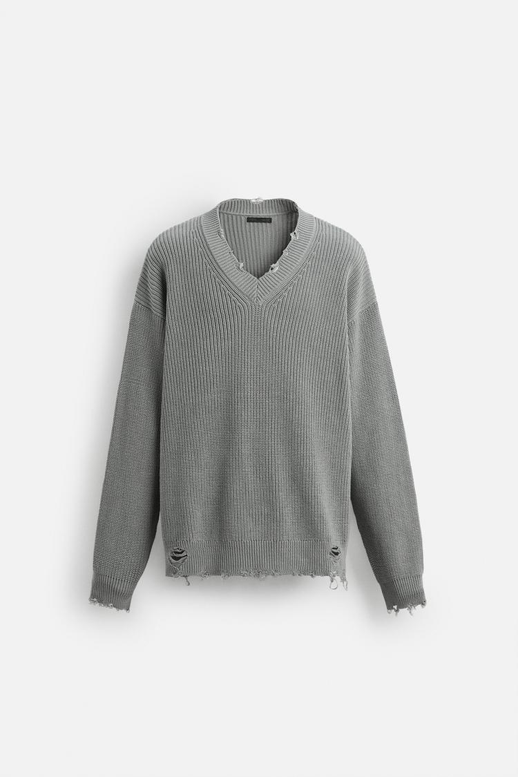 TEXTURED SWEATER WITH RIPS