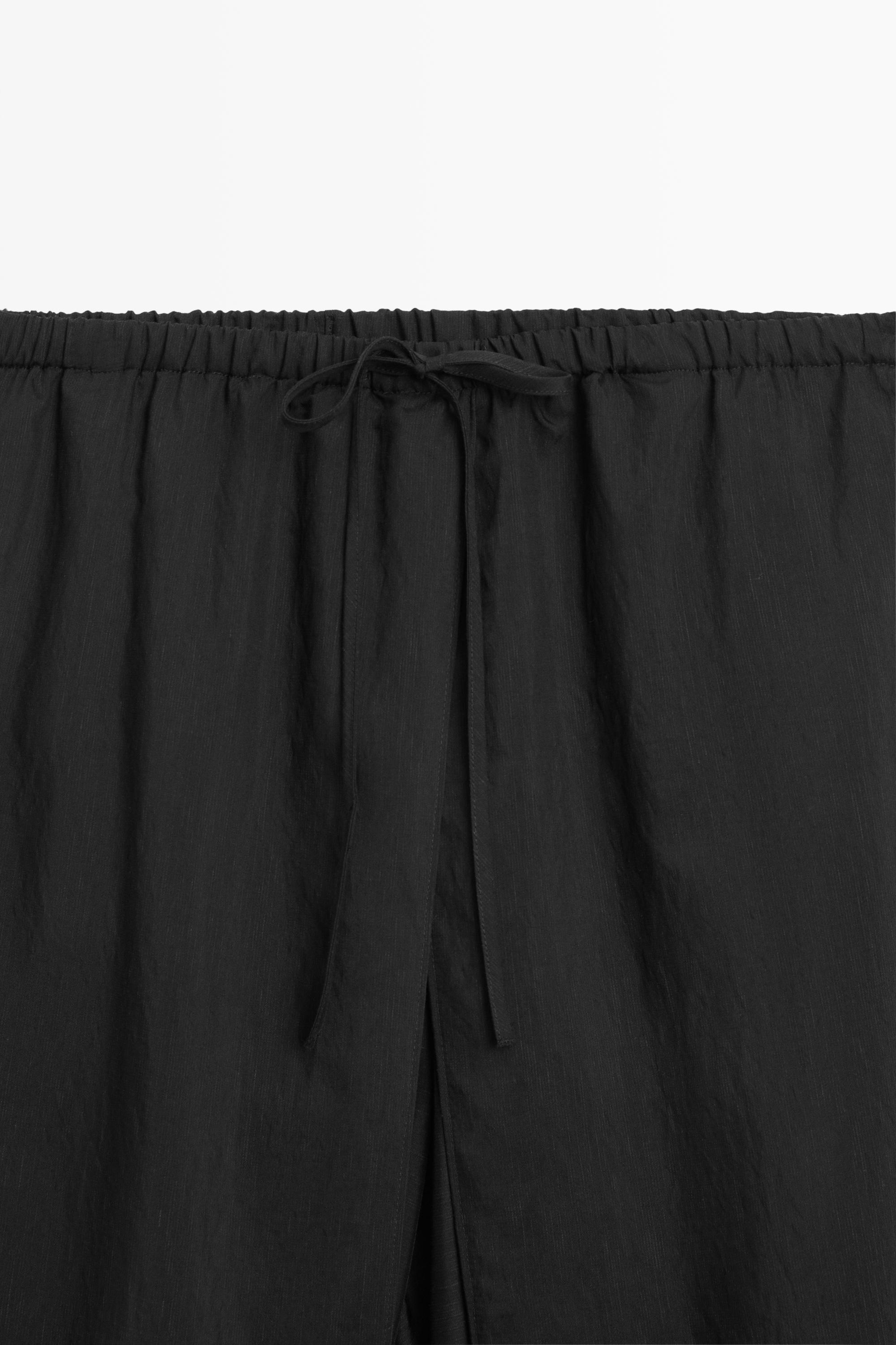 Double-layer pants with tie detail