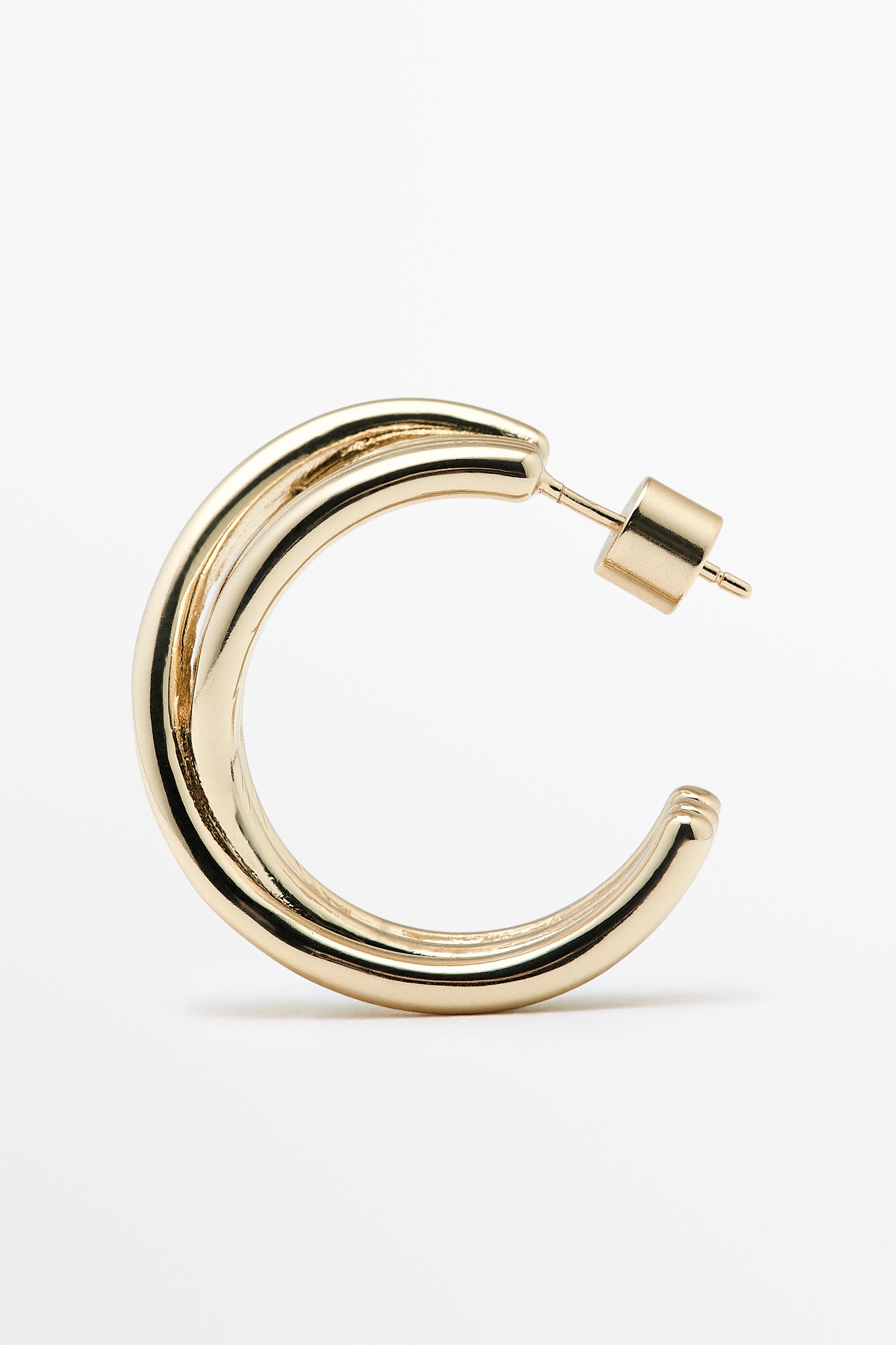 Shimmery hoop earrings — Golden