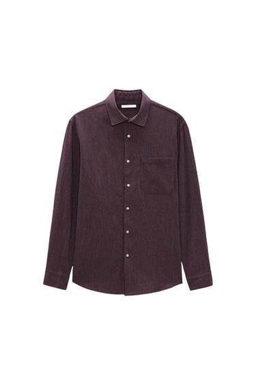 Long-sleeved shirt with a small check pattern in dark tones, front buttons and chest pocket, on a white background.