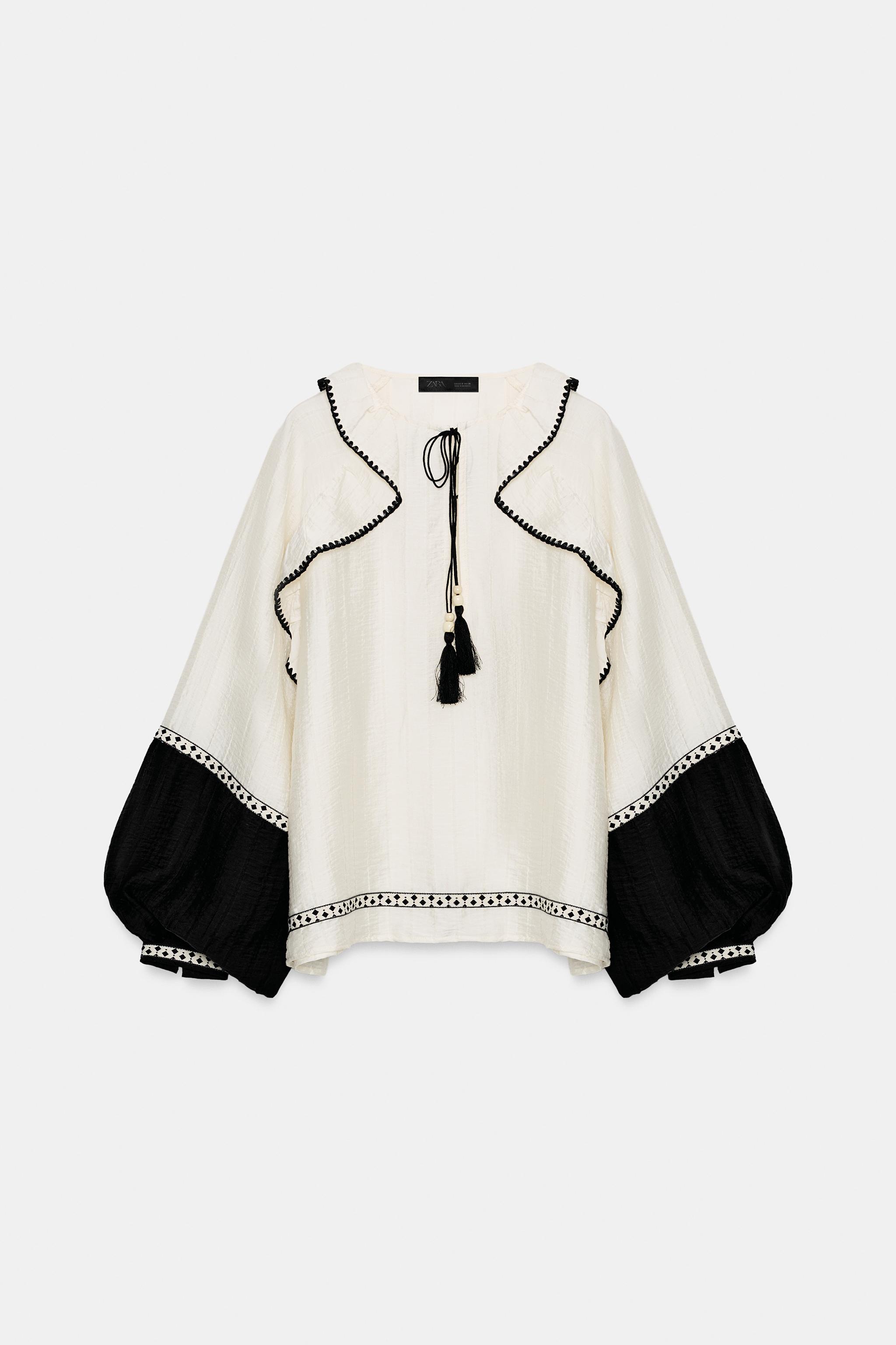 VOLUMINOUS RUFFLE BLOUSE