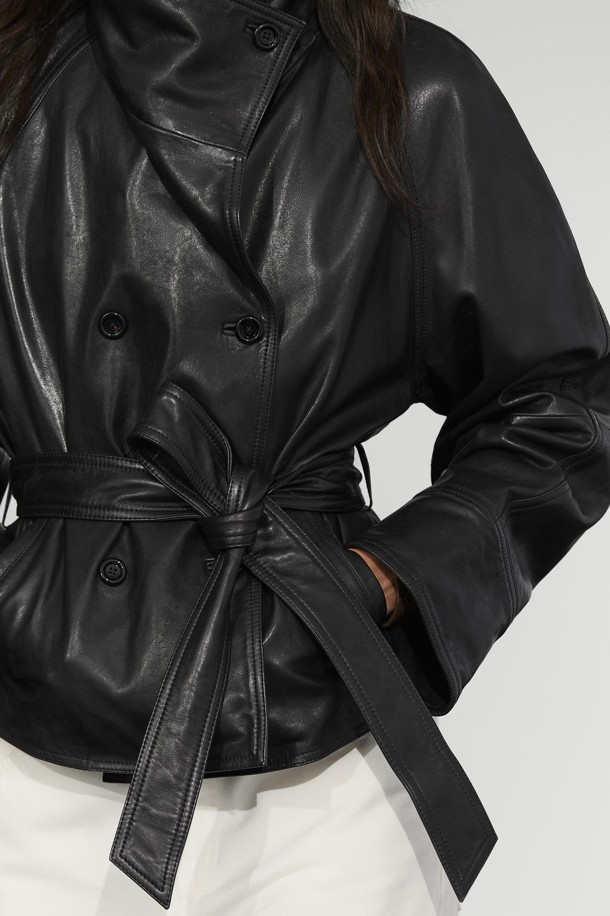 Short leather jacket with belt