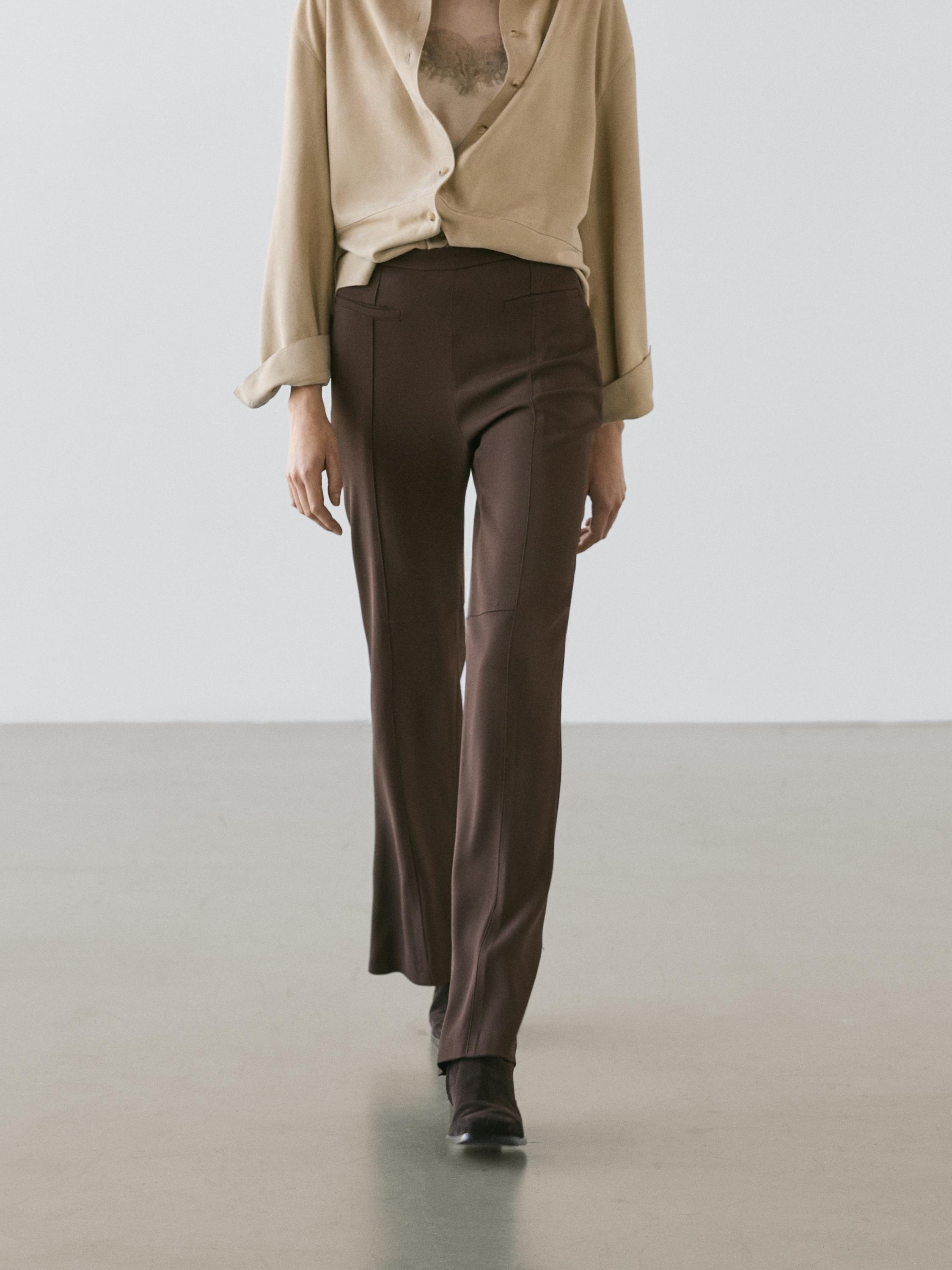 Flared trousers with pocket — Brown