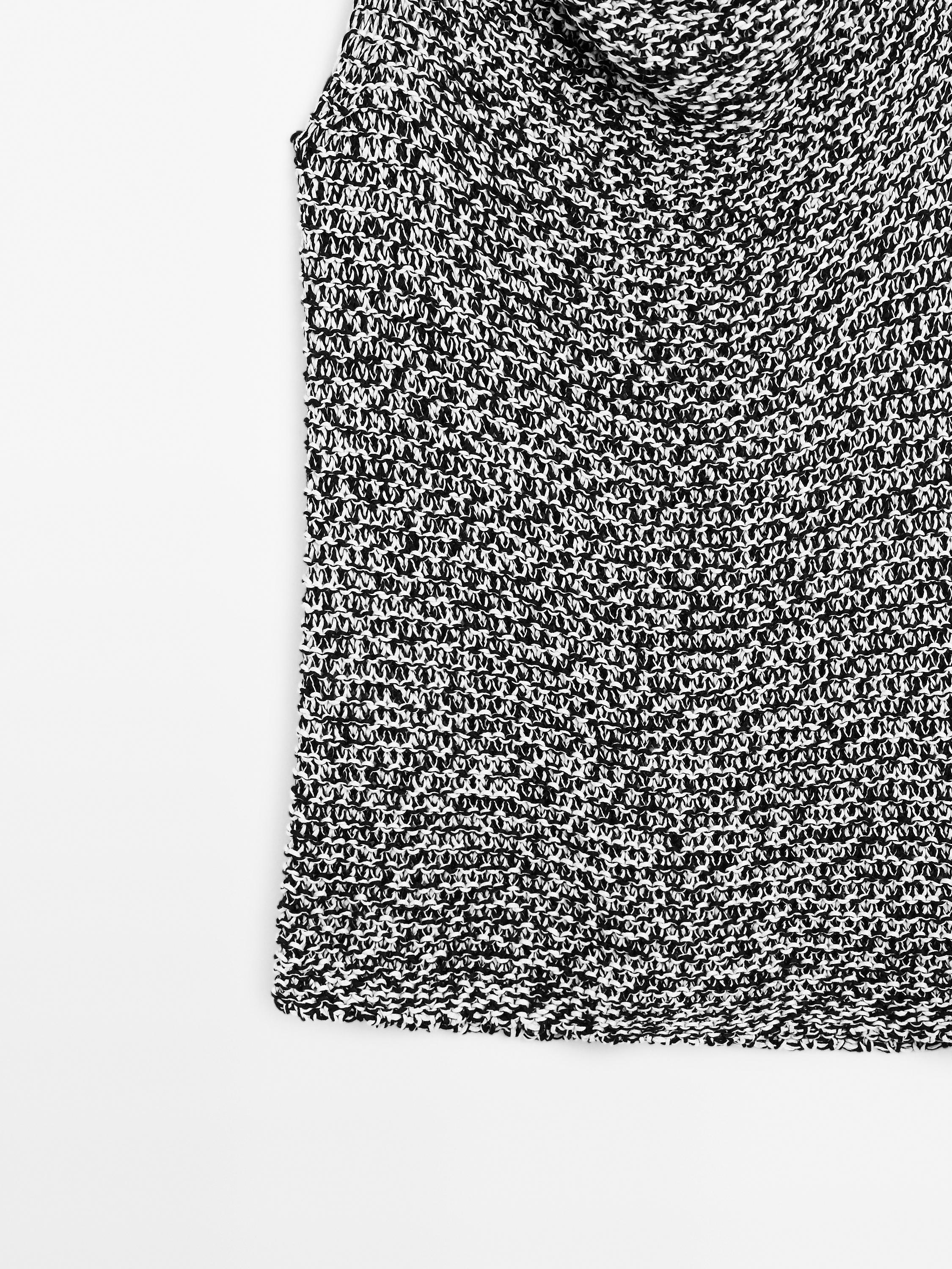 Top drapé en maille chinée
