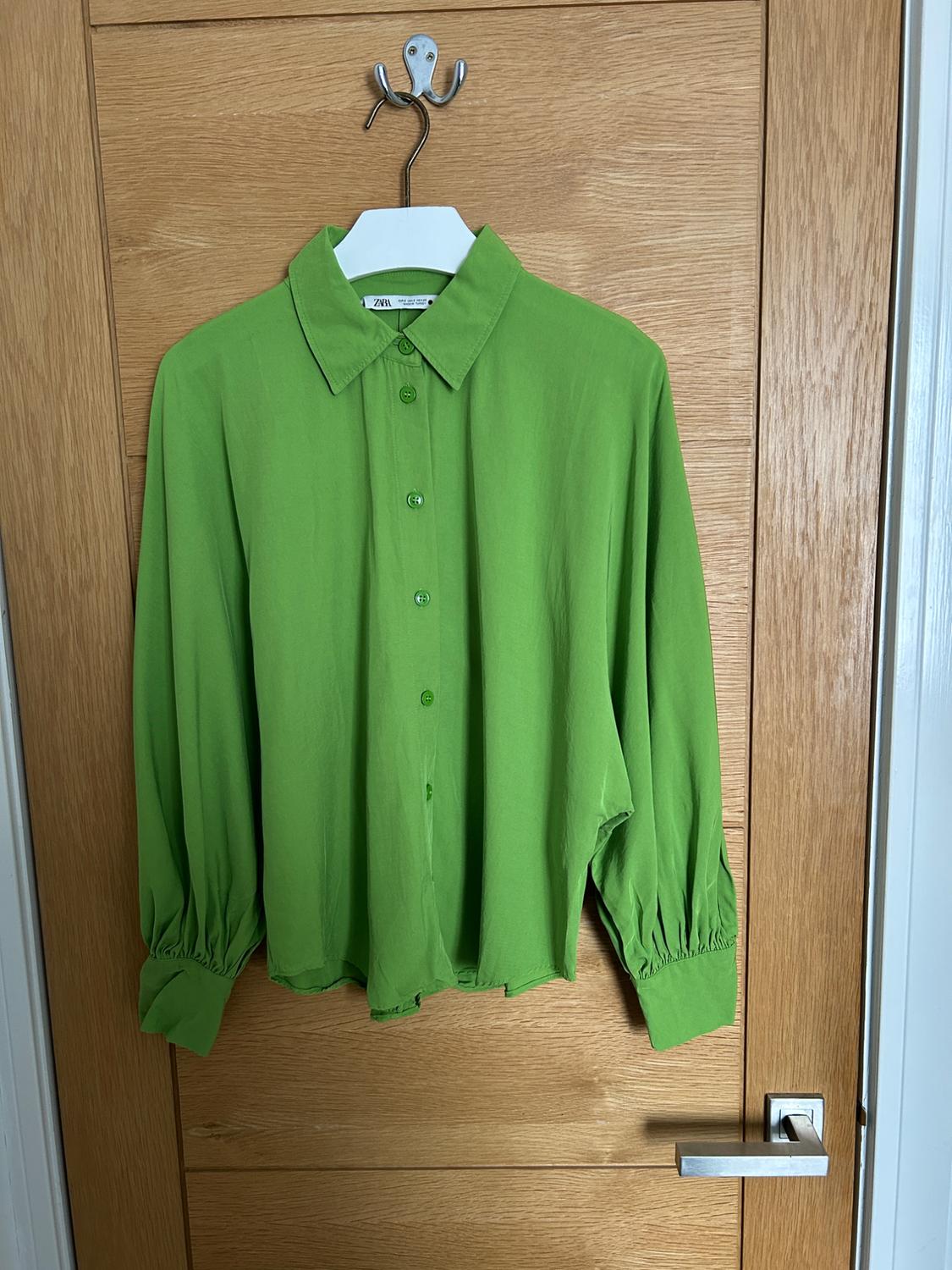 BLOUSE WITH VOLUMINOUS SLEEVES