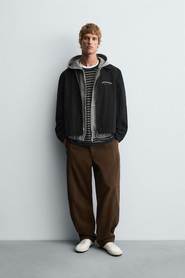 جاكيت بتطريزات وسحاب - أسود الخاص بـ Zara