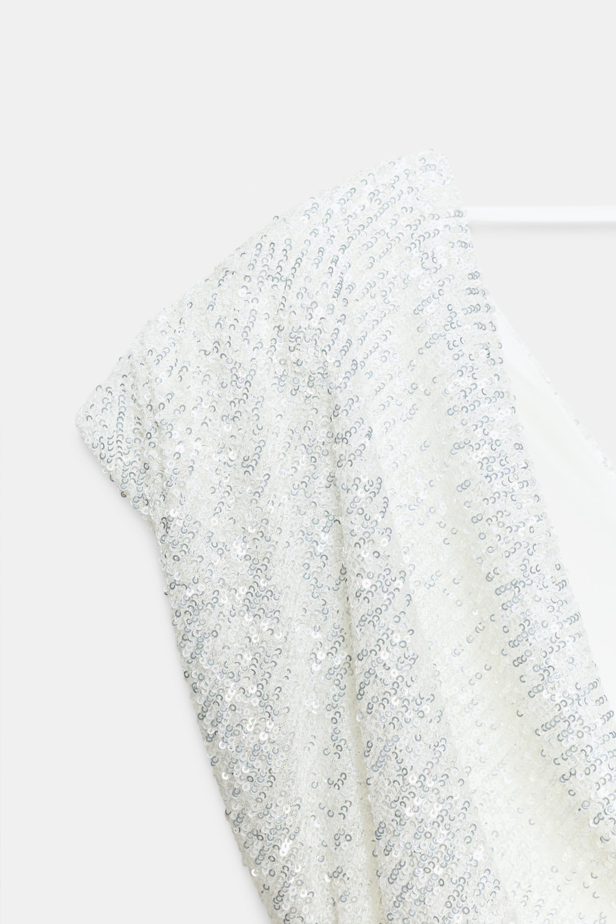 ROBE COURTE À PAILLETTES