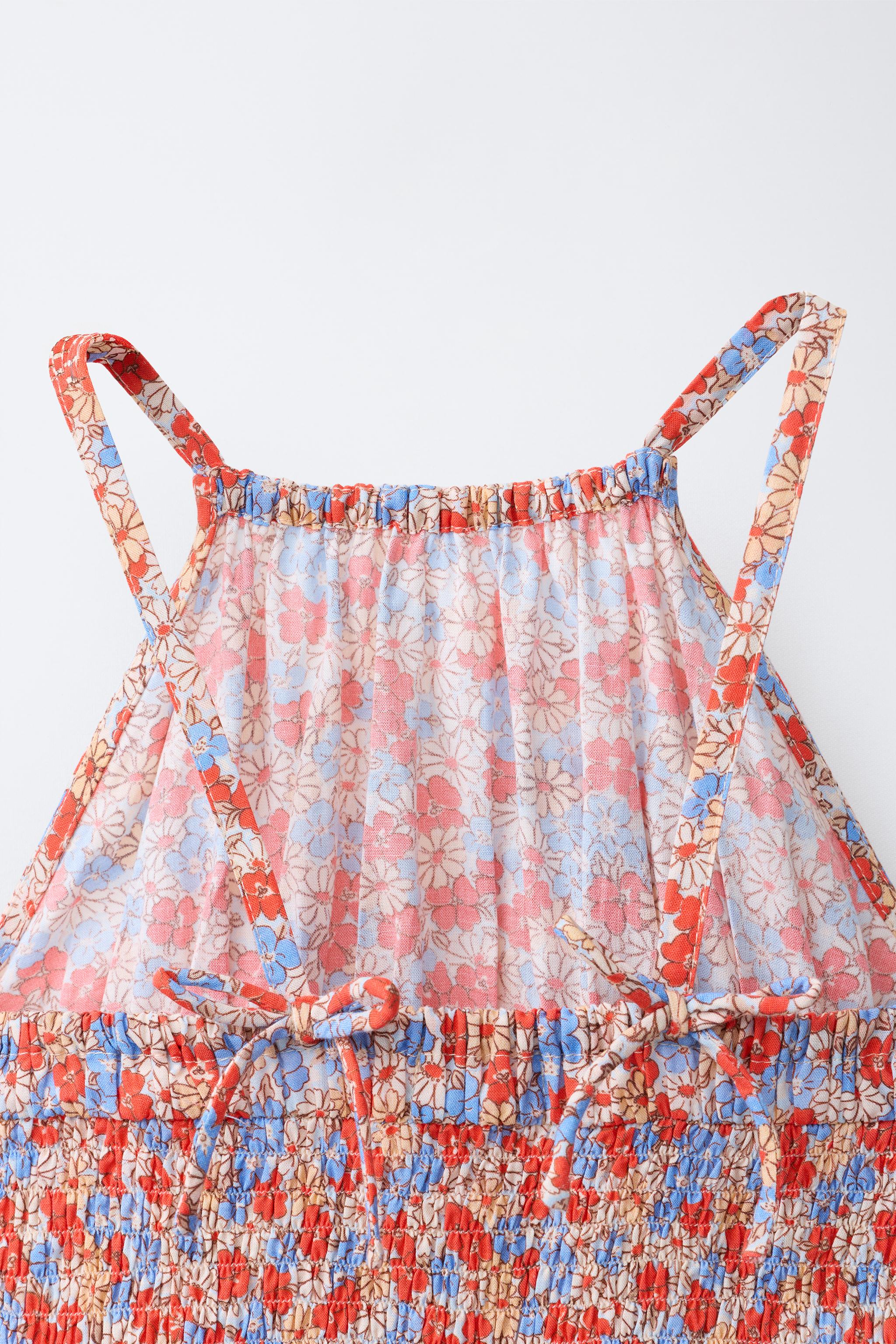 SHORT RUFFLED FLORAL JUMPSUIT