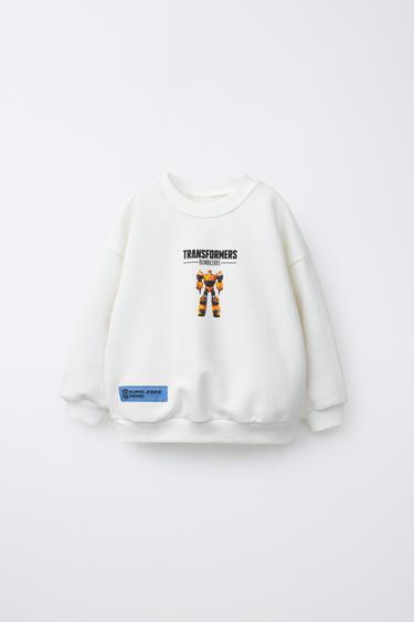 ТОЛСТОВКА С ПРИНТОМ TRANSFORMERS® — ЭКРЮ от Zara
