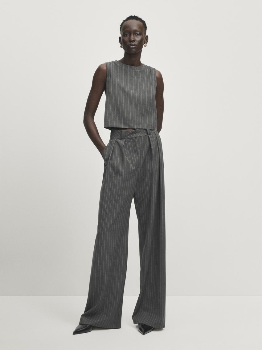 Black barrel-fit trousers with belt