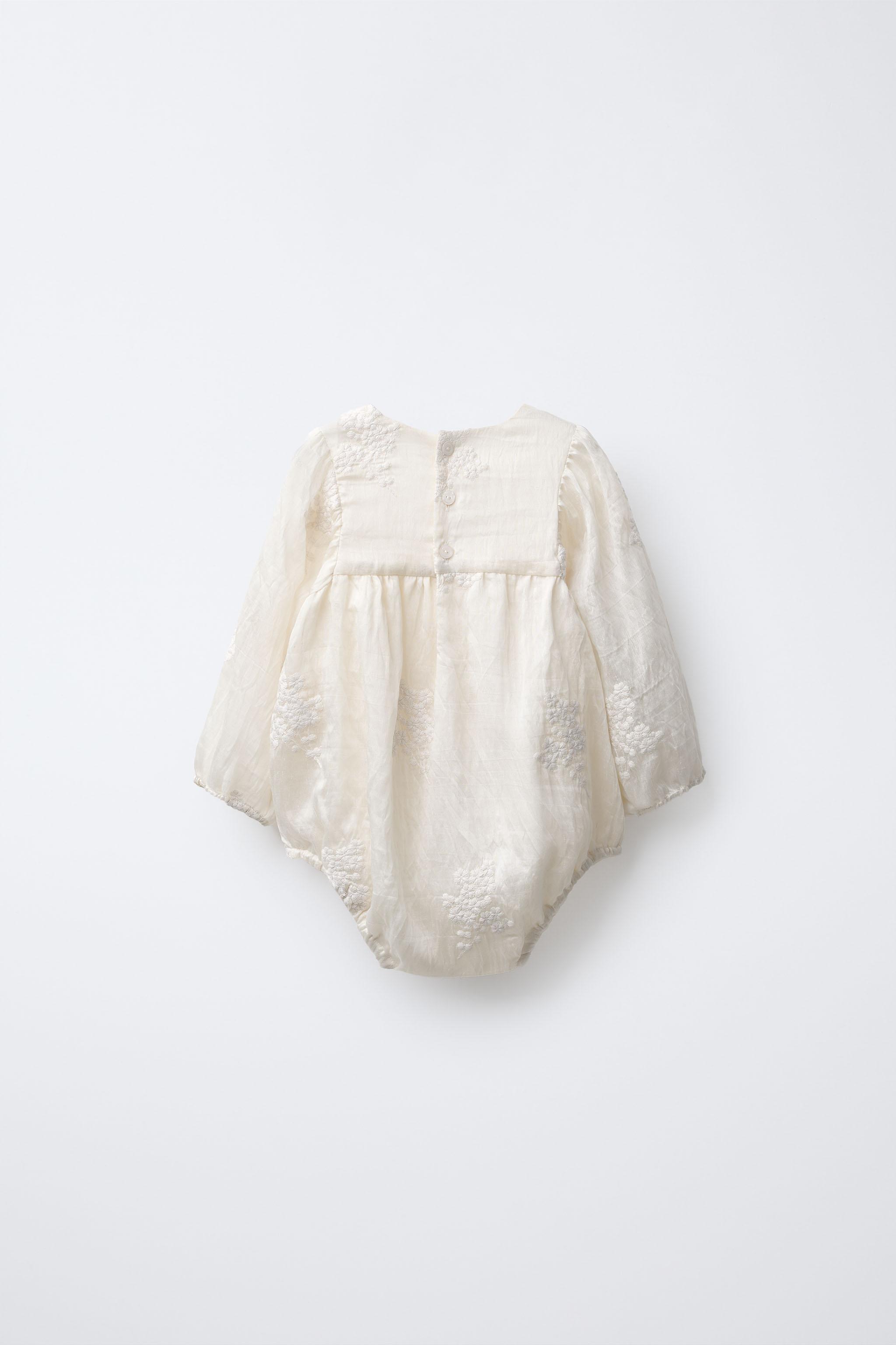 EMBROIDERED FLORAL ROMPER