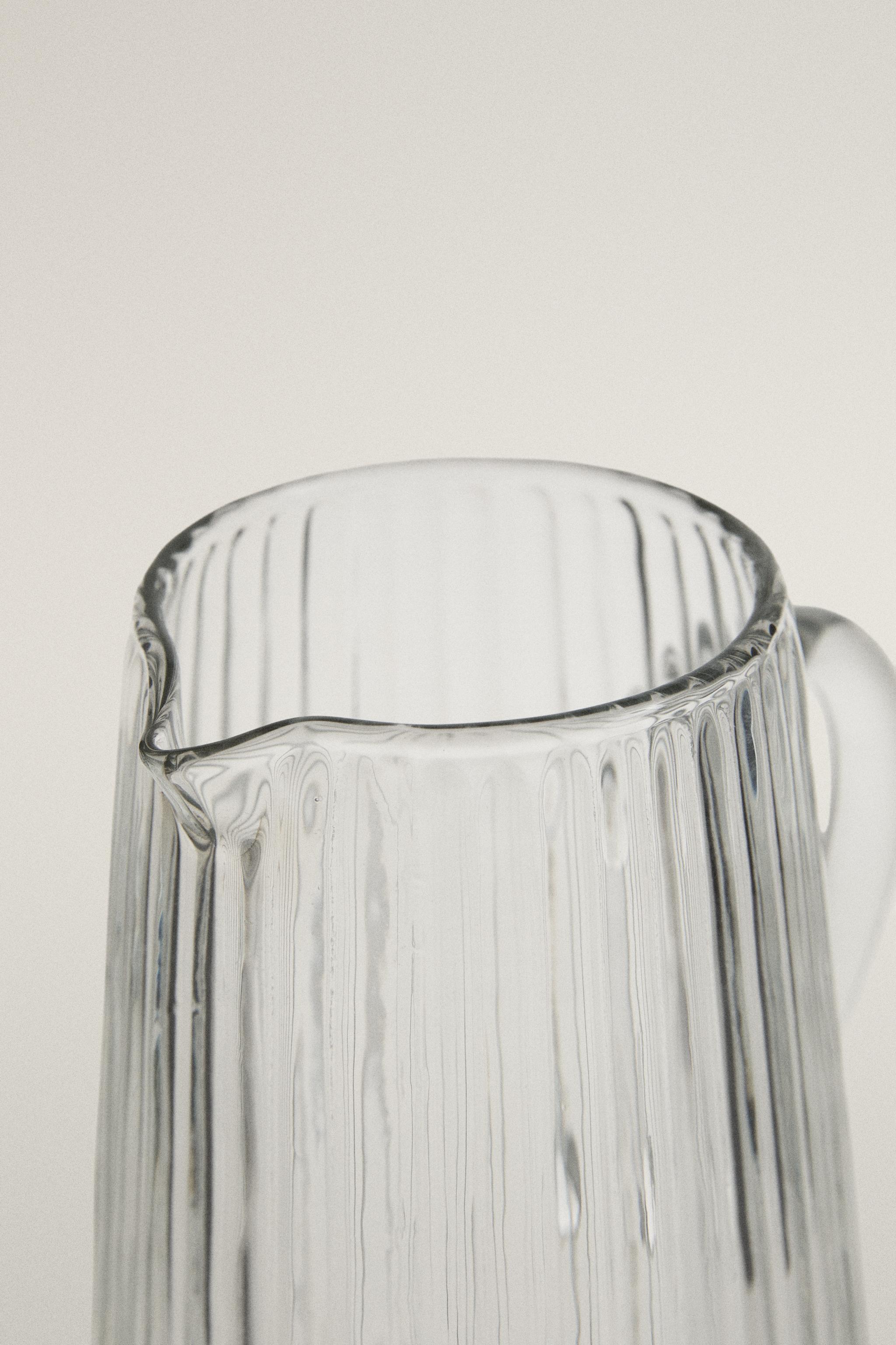 FACETED RAISED DESIGN GLASS PITCHER