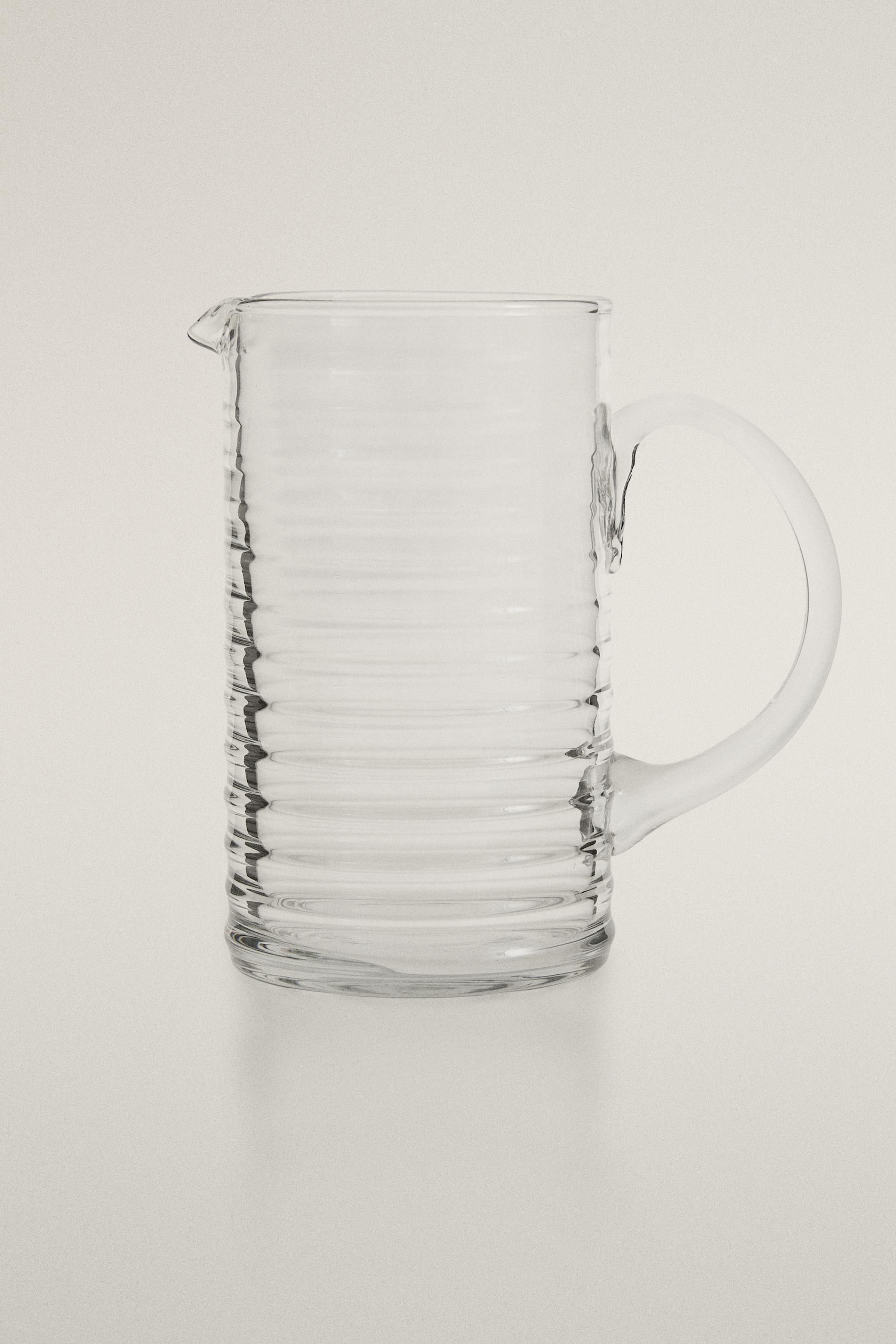 GLASS PITCHER WITH RAISED LINES