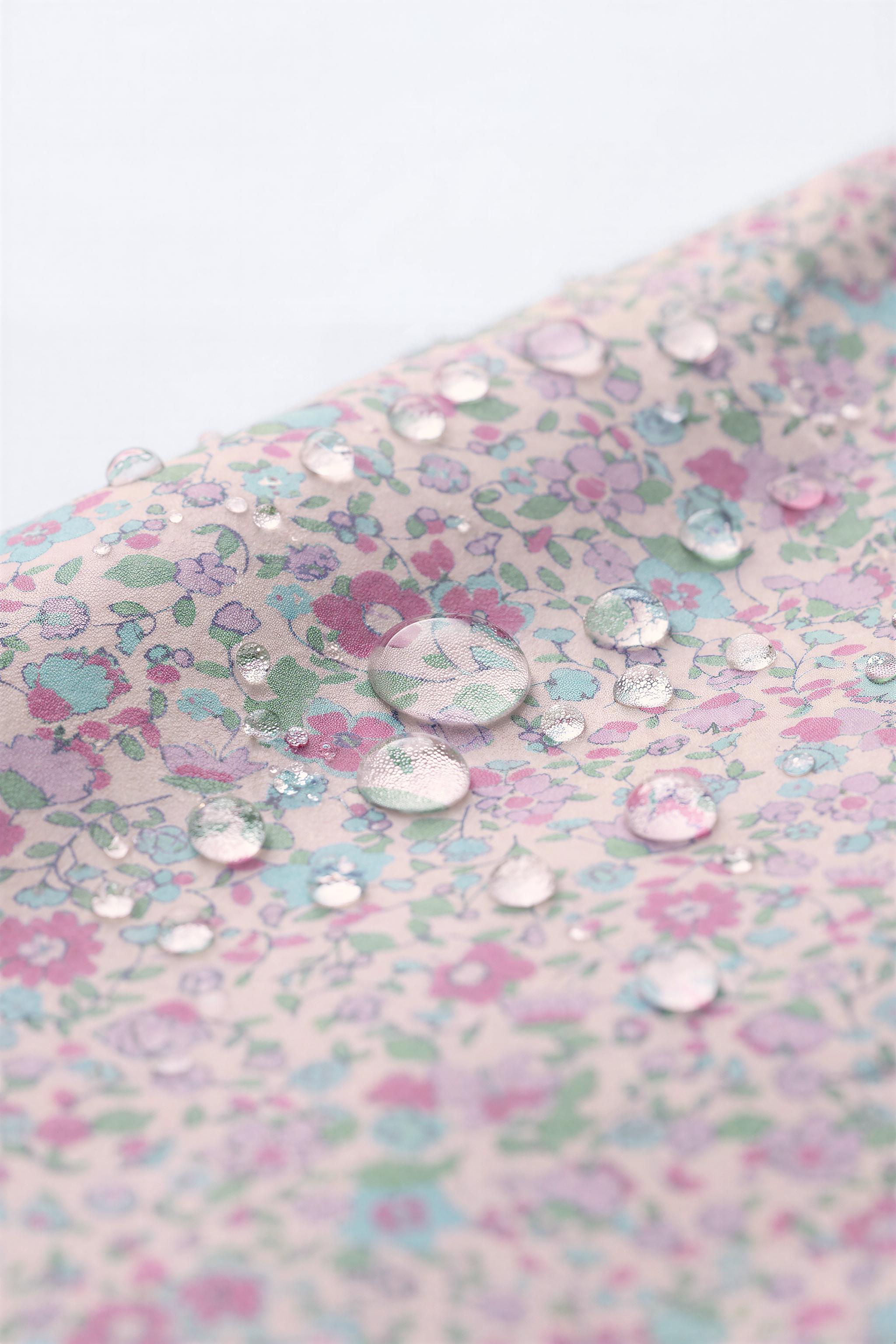 RUBBERIZED FLORAL WATER REPELLENT RAINCOAT