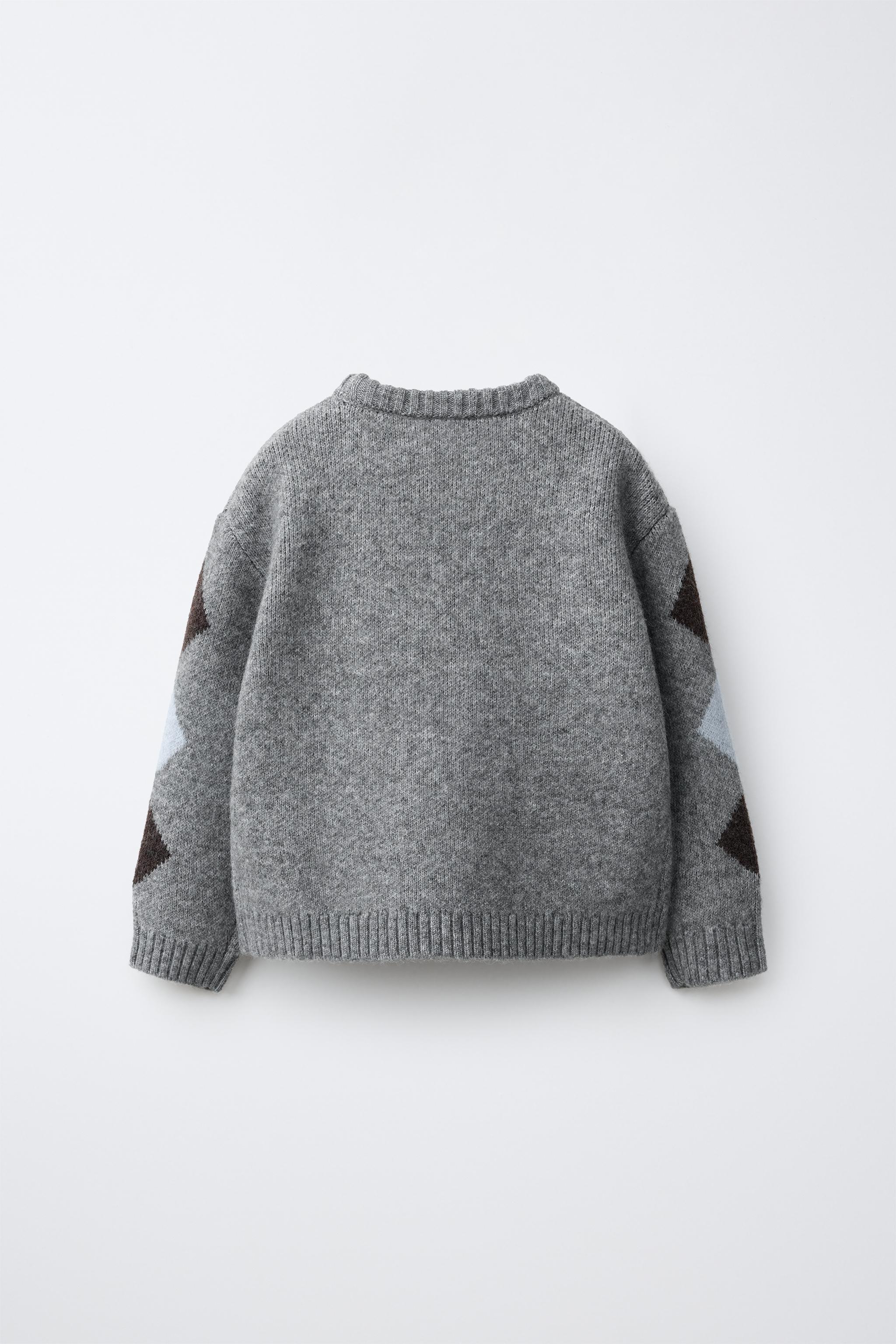 PULL EN MAILLE LOSANGES ET FLEURS BRODÉES