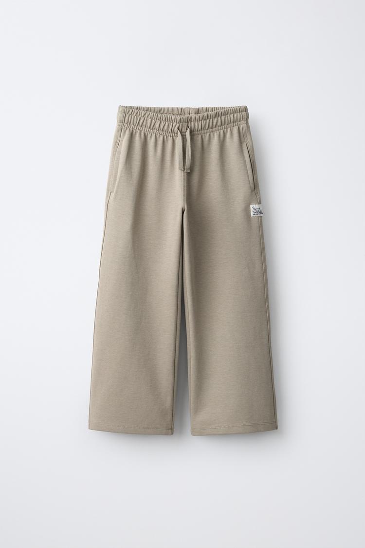 Pantalon interlock etiqueta